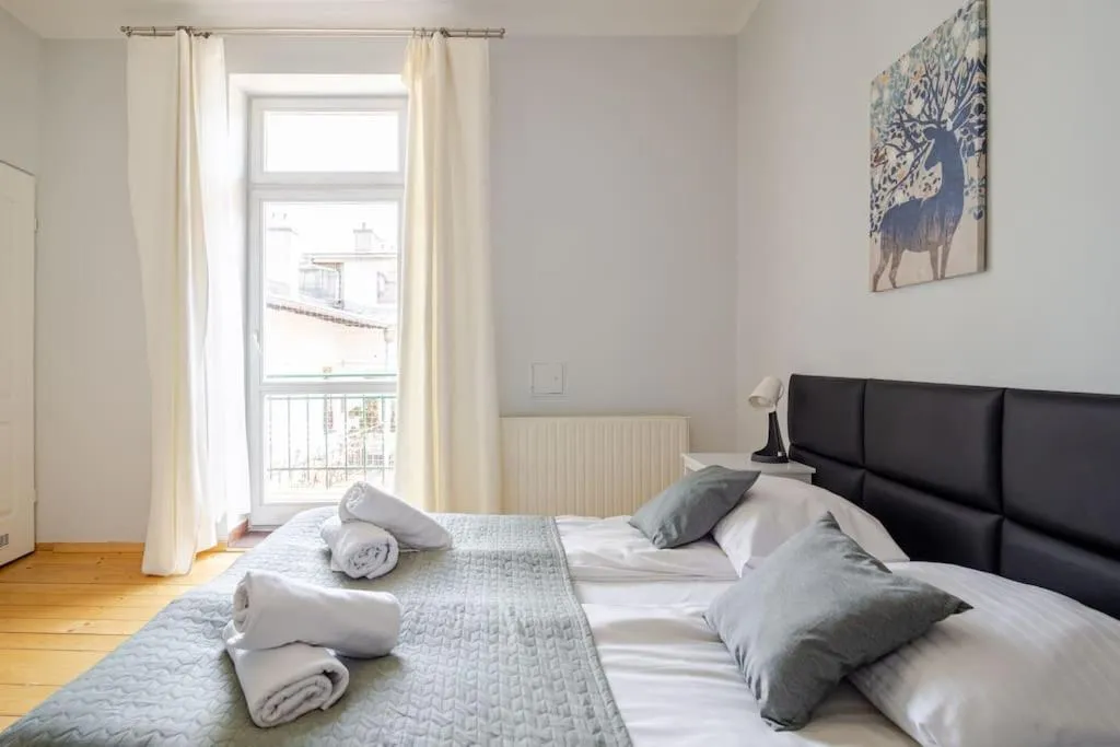 Bed in Florianska Gate Luxury Apartments