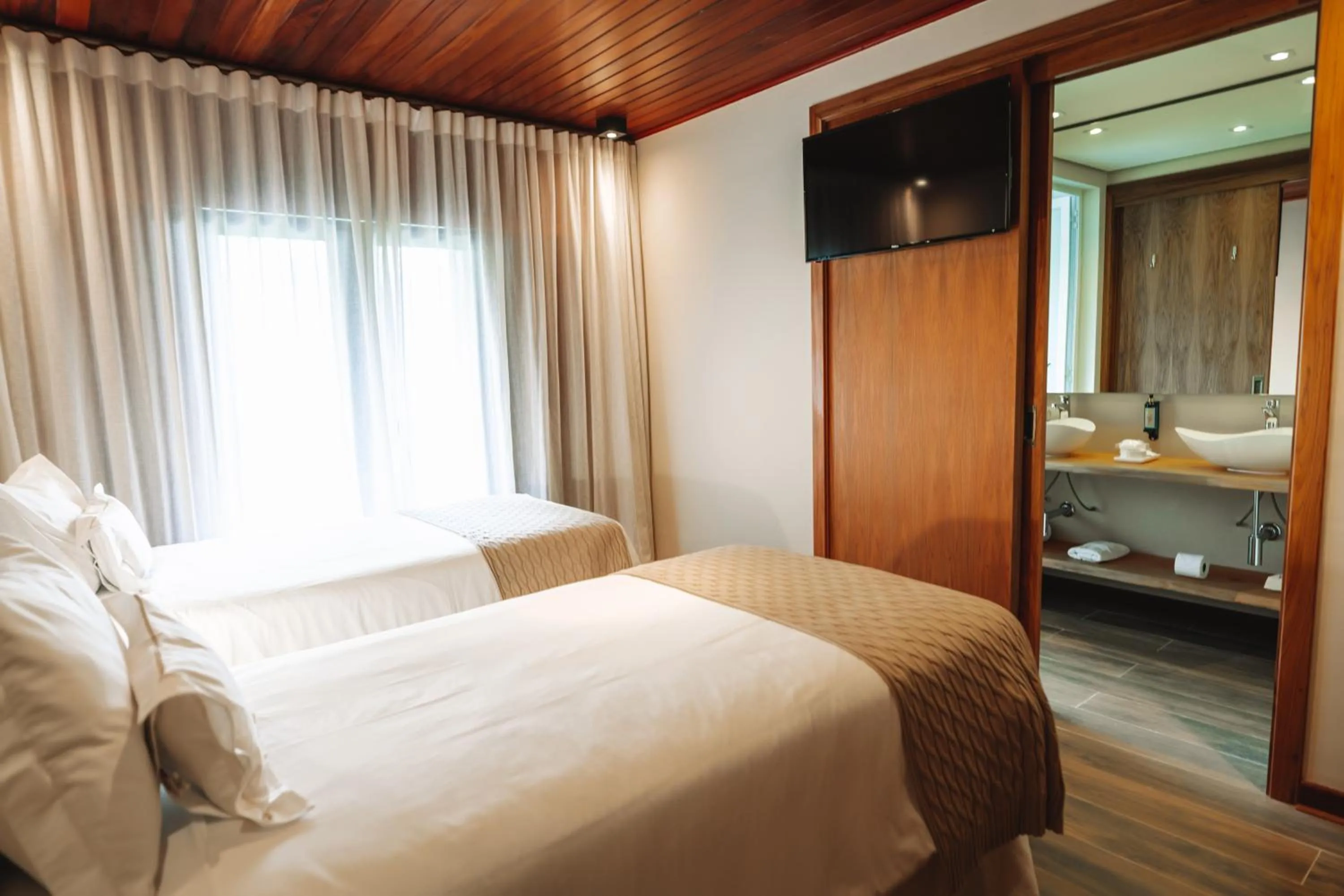 Bed in Hotel Boutique QUEBRA-NOZ