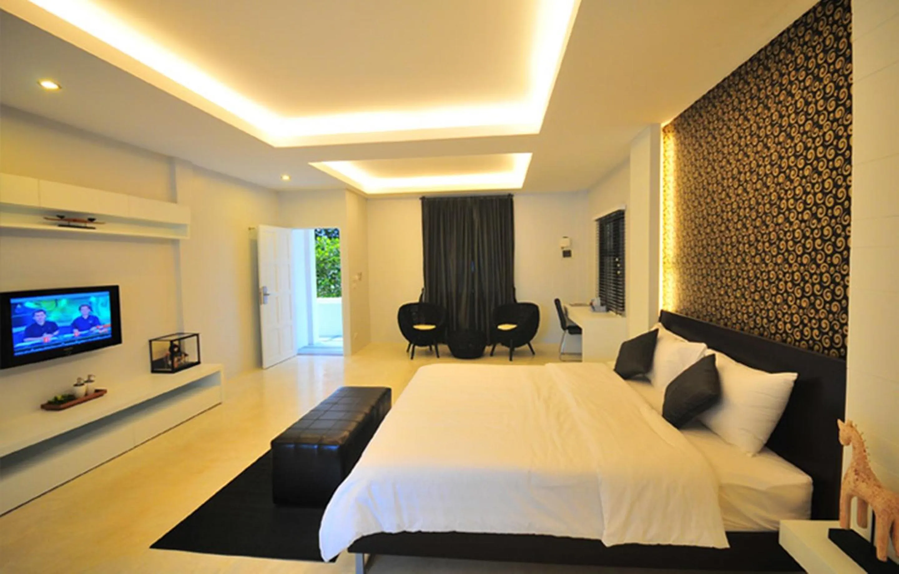 Photo of the whole room, Bed in Surintra Boutique Resort