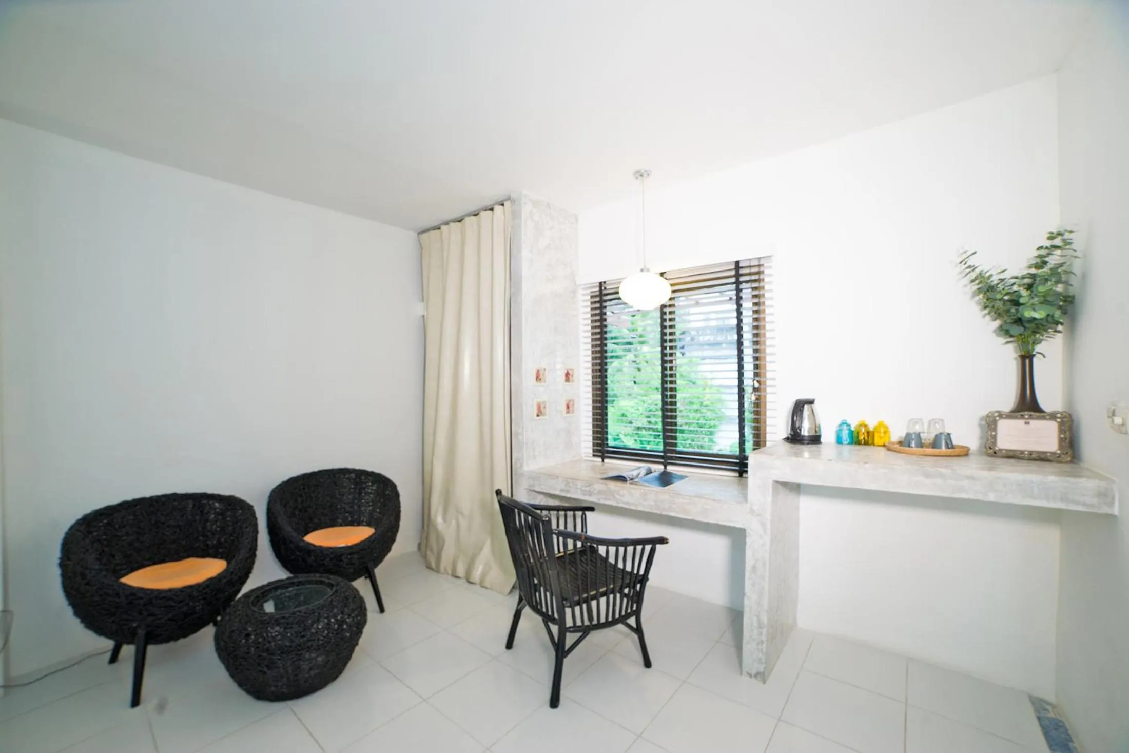 Seating area in Surintra Boutique Resort