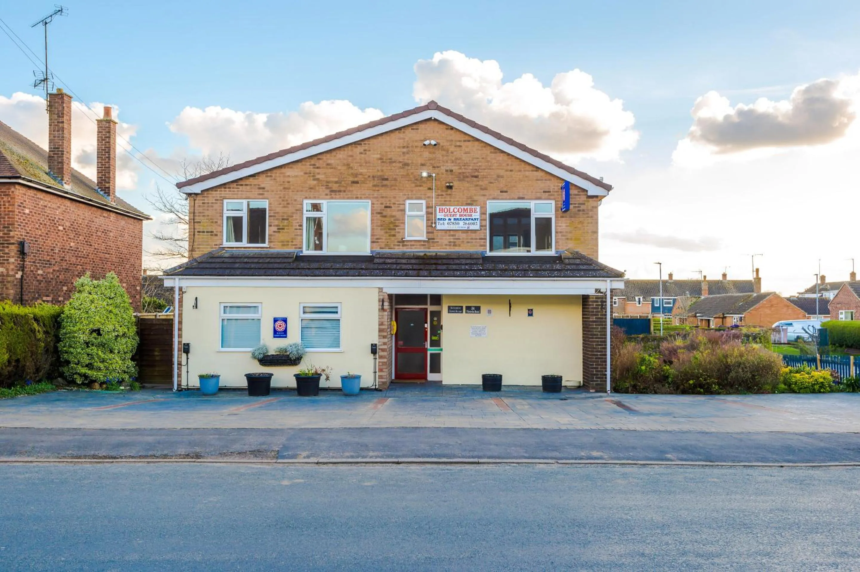 Property building in Holcombe Guest House