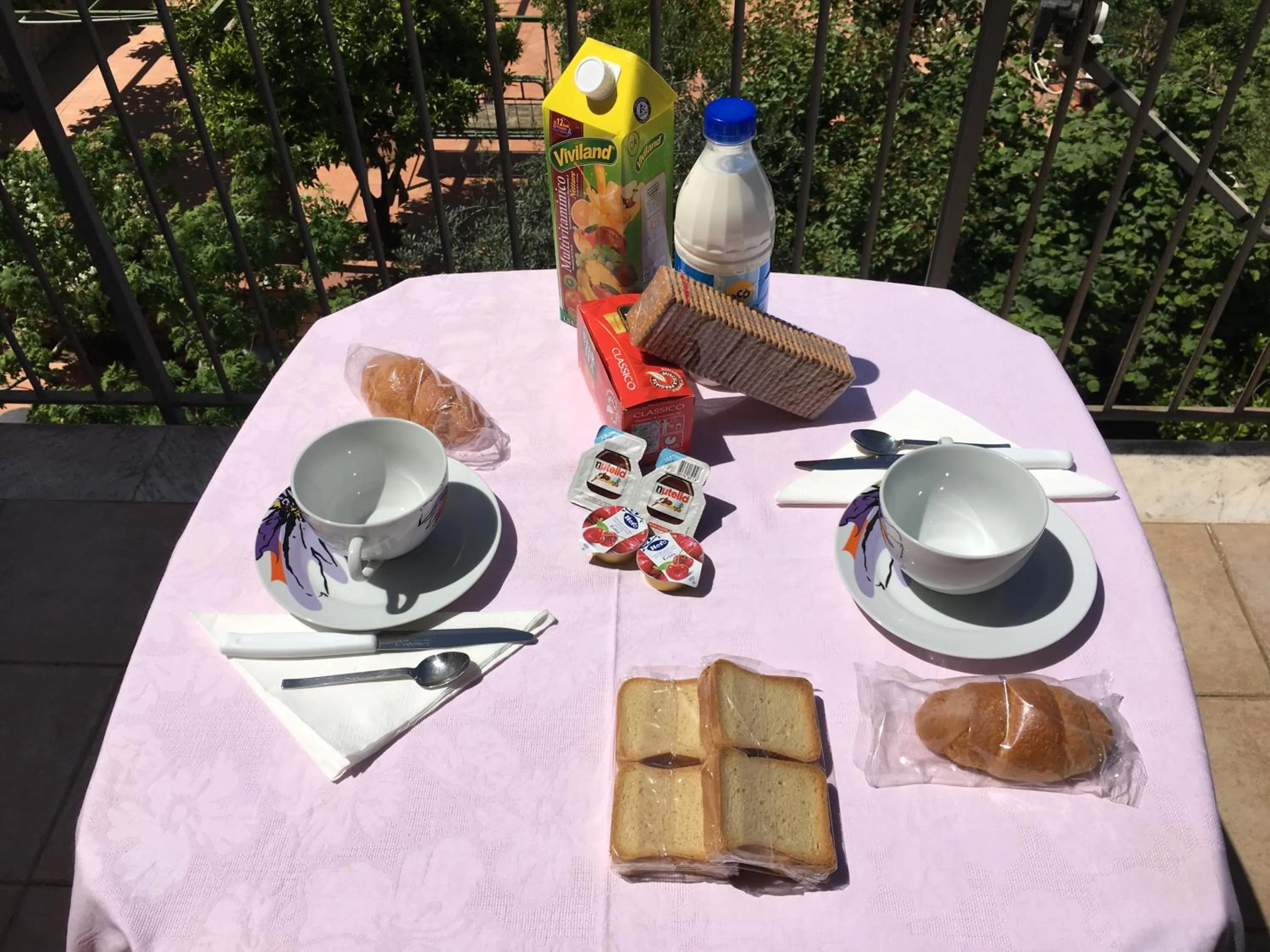 Italian breakfast in villa eden