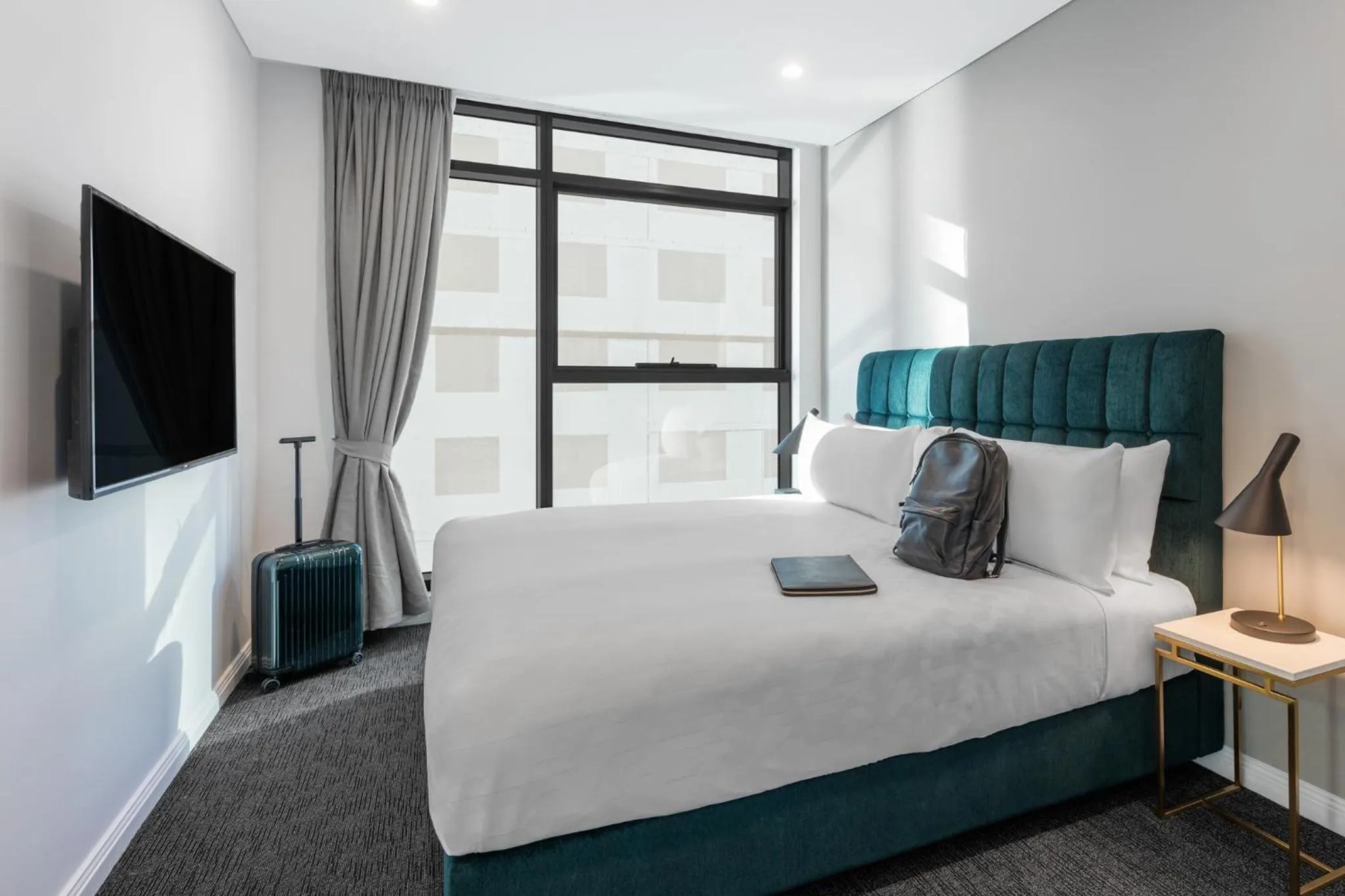 Bed in Meriton Suites Sussex Street, Sydney