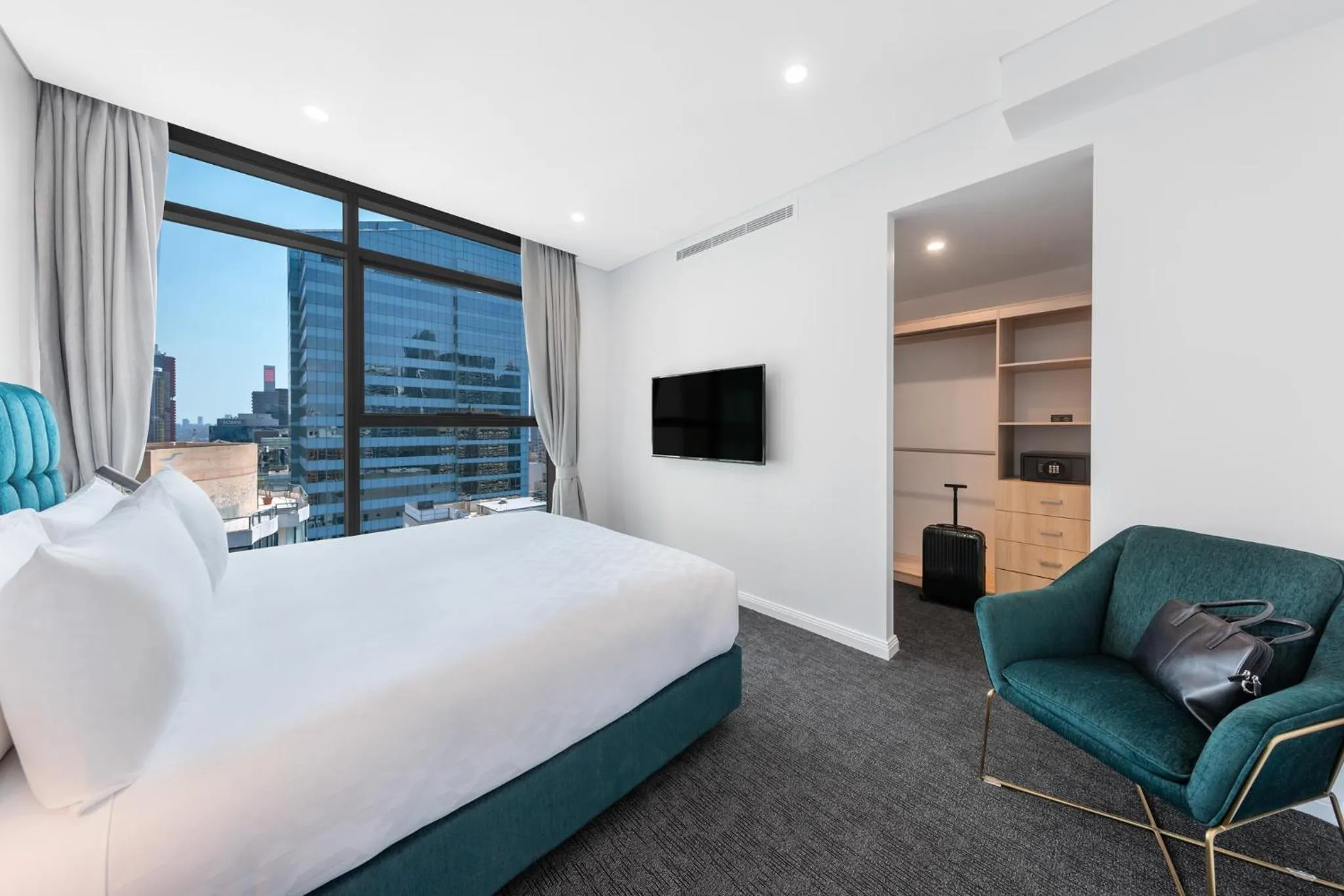 Bed in Meriton Suites Sussex Street, Sydney