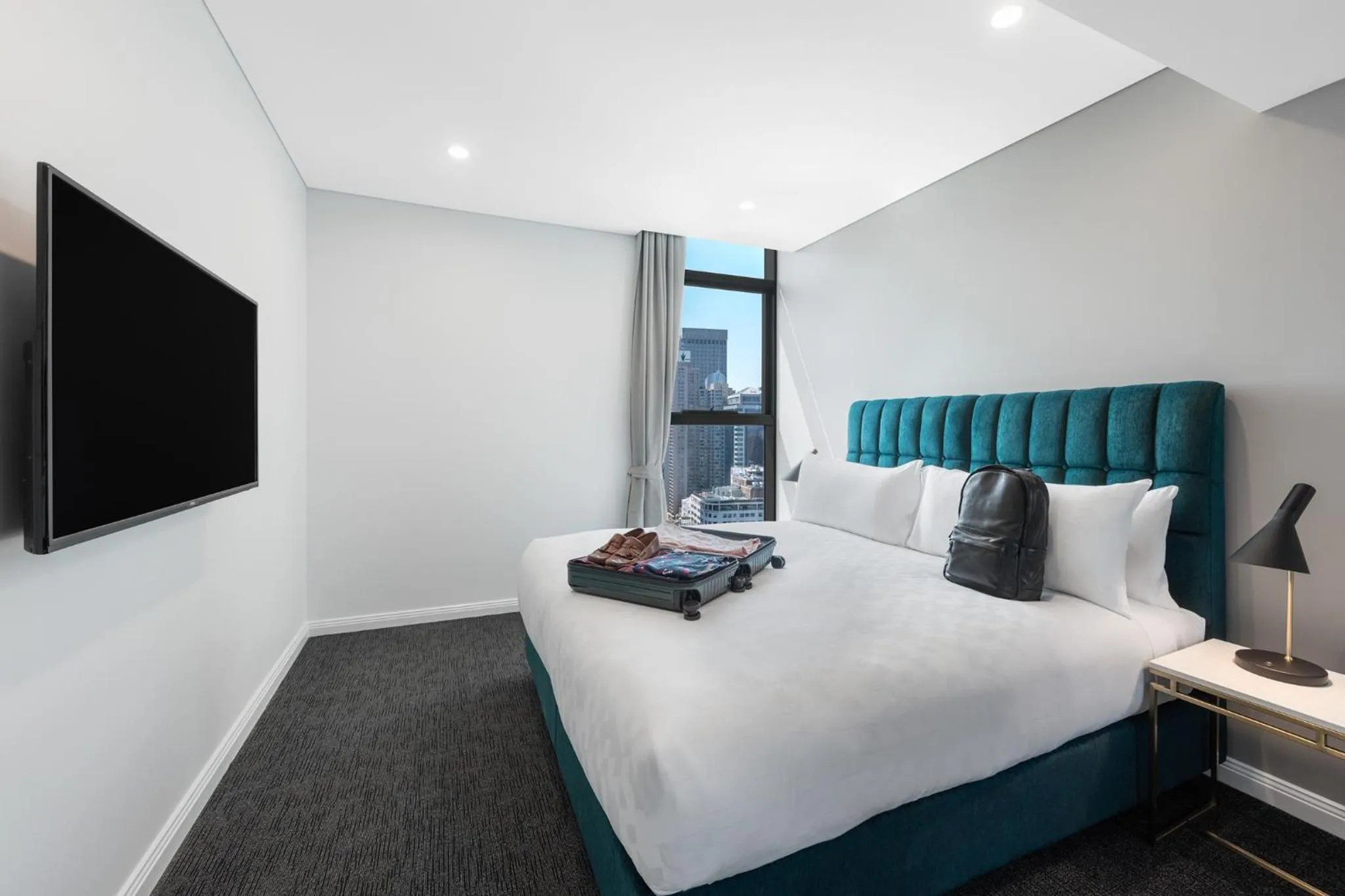 Bed in Meriton Suites Sussex Street, Sydney