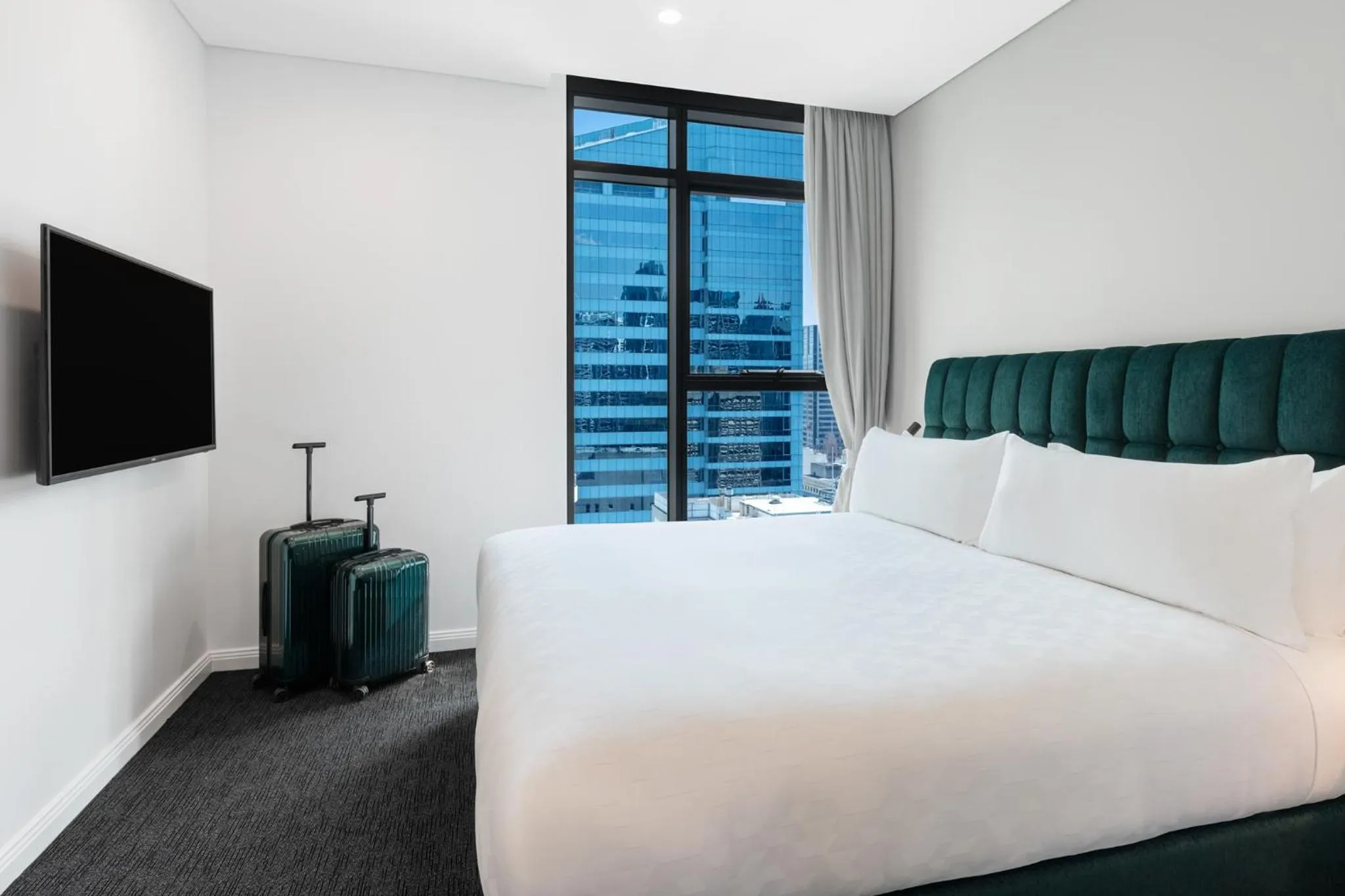 Bed in Meriton Suites Sussex Street, Sydney