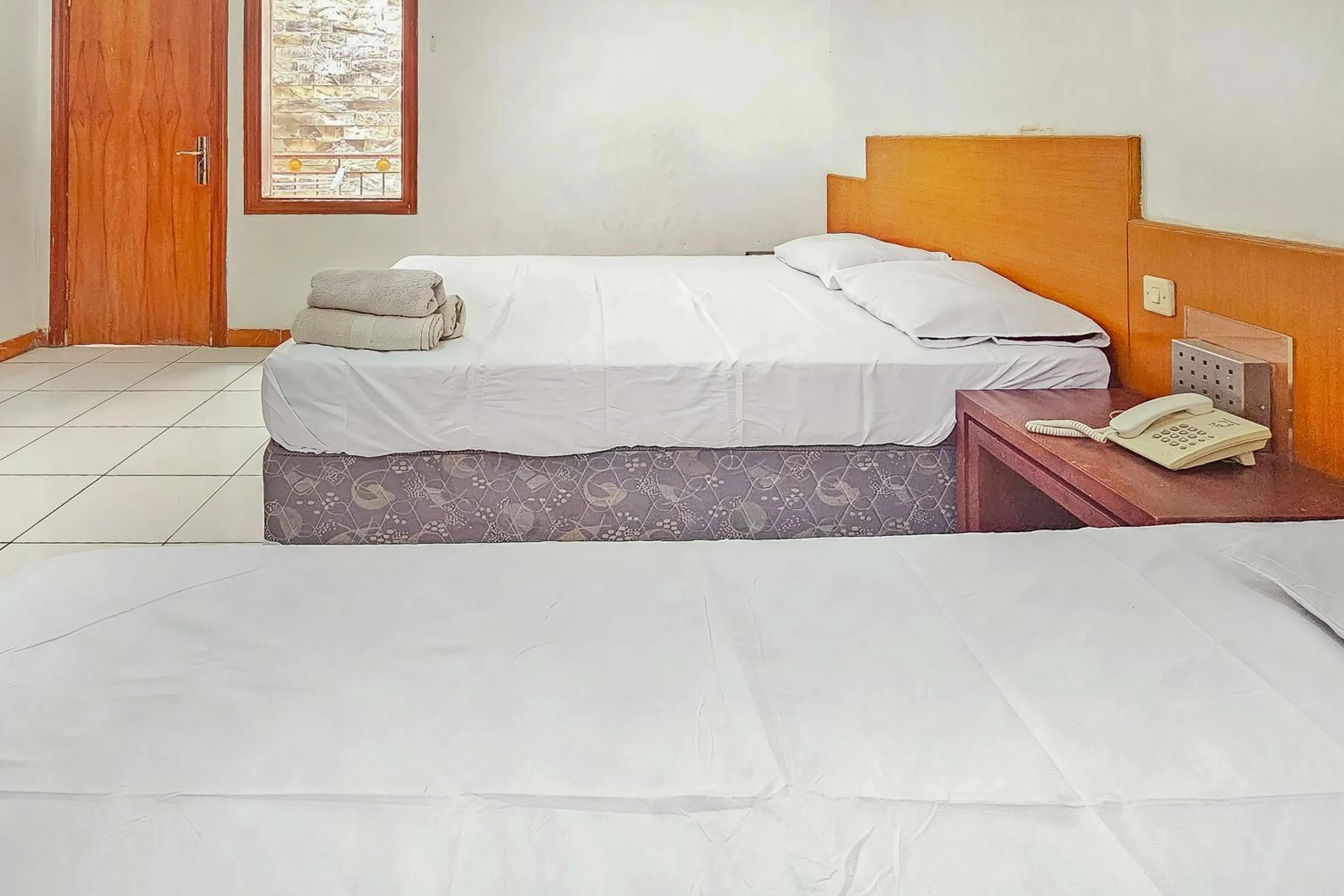 Bed in Pandu Prima Guest House Syariah Mitra Reddoorz