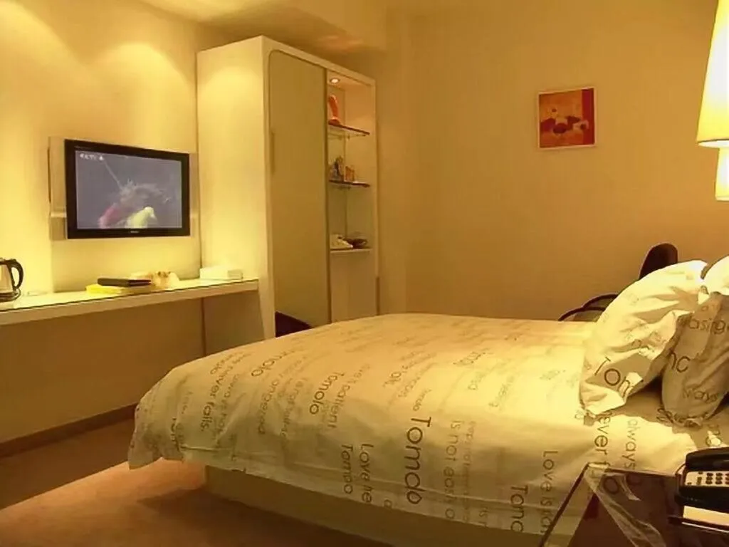 Bedroom in Tomolo Hotel Wuzhan Branch
