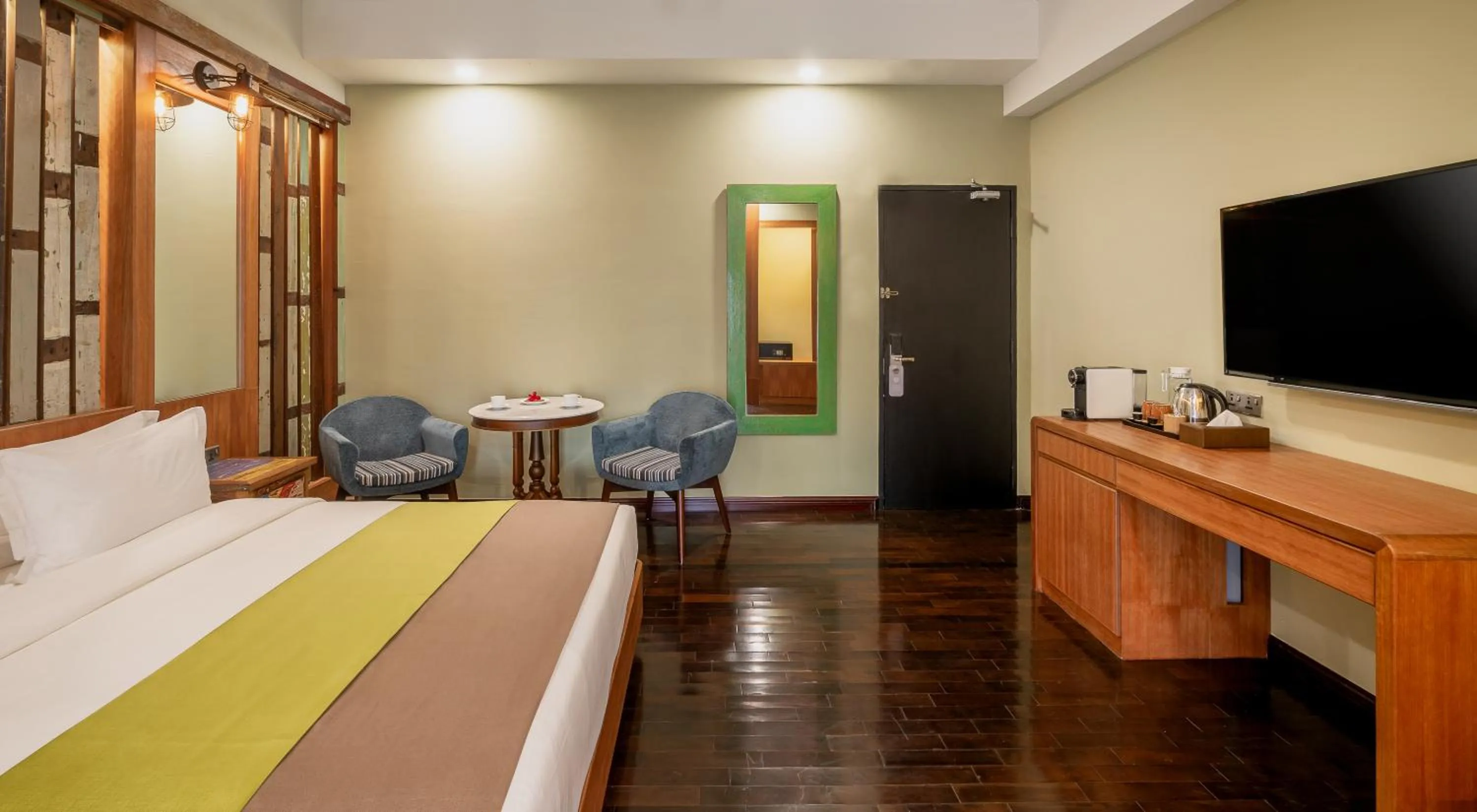 Bed in Treasures Hotel and Suites