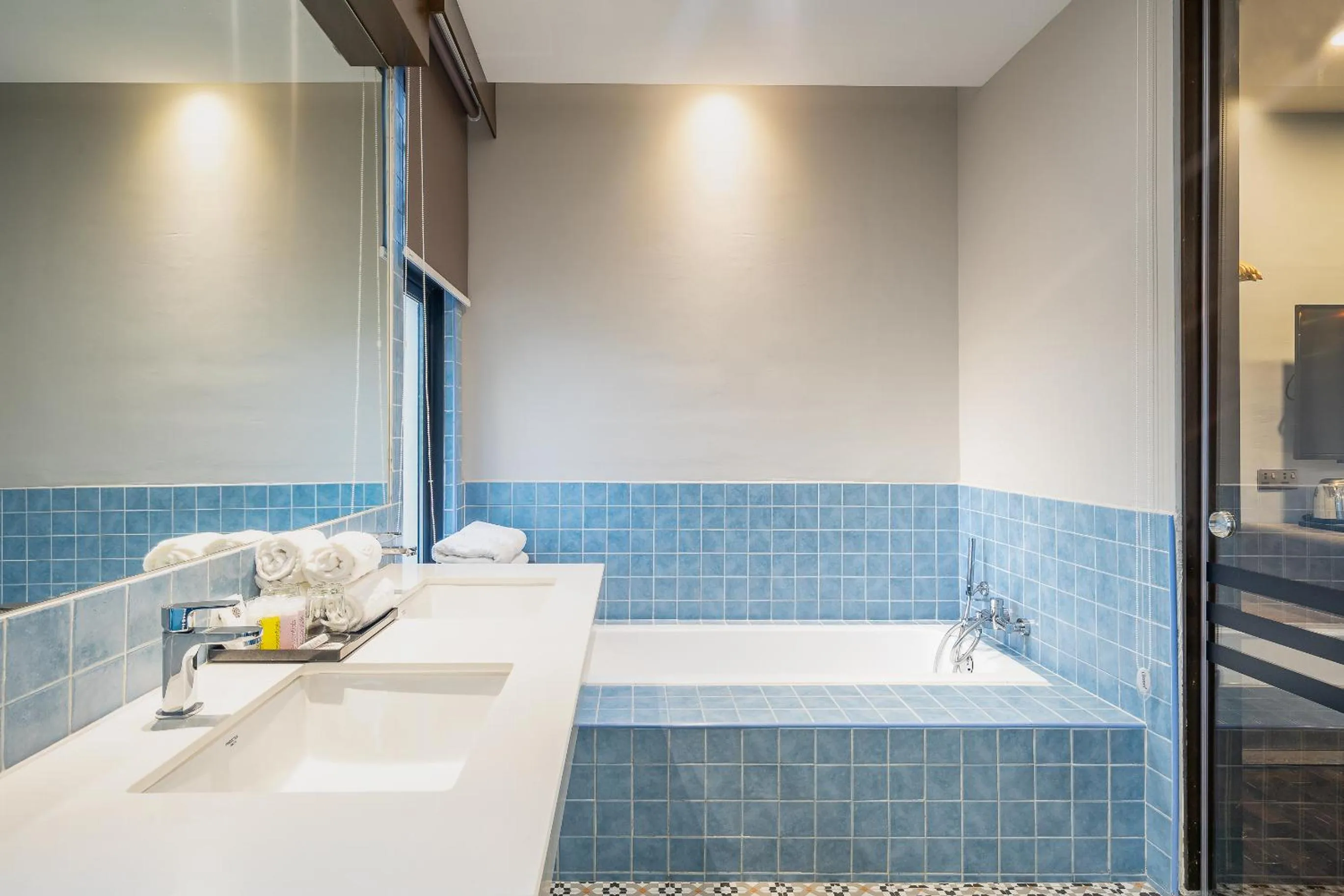 Bed in Treasures Hotel and Suites