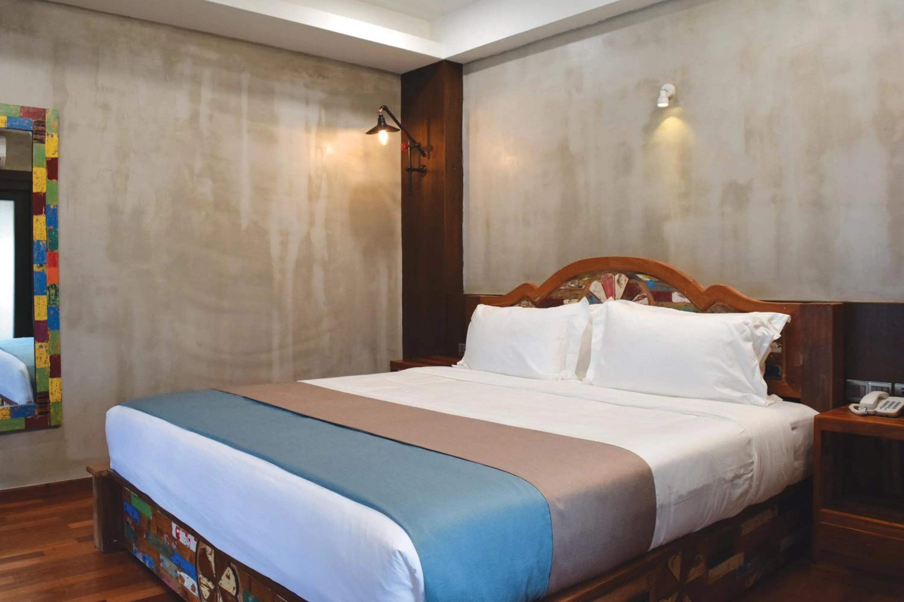 Bedroom, Bed in Treasures Hotel and Suites