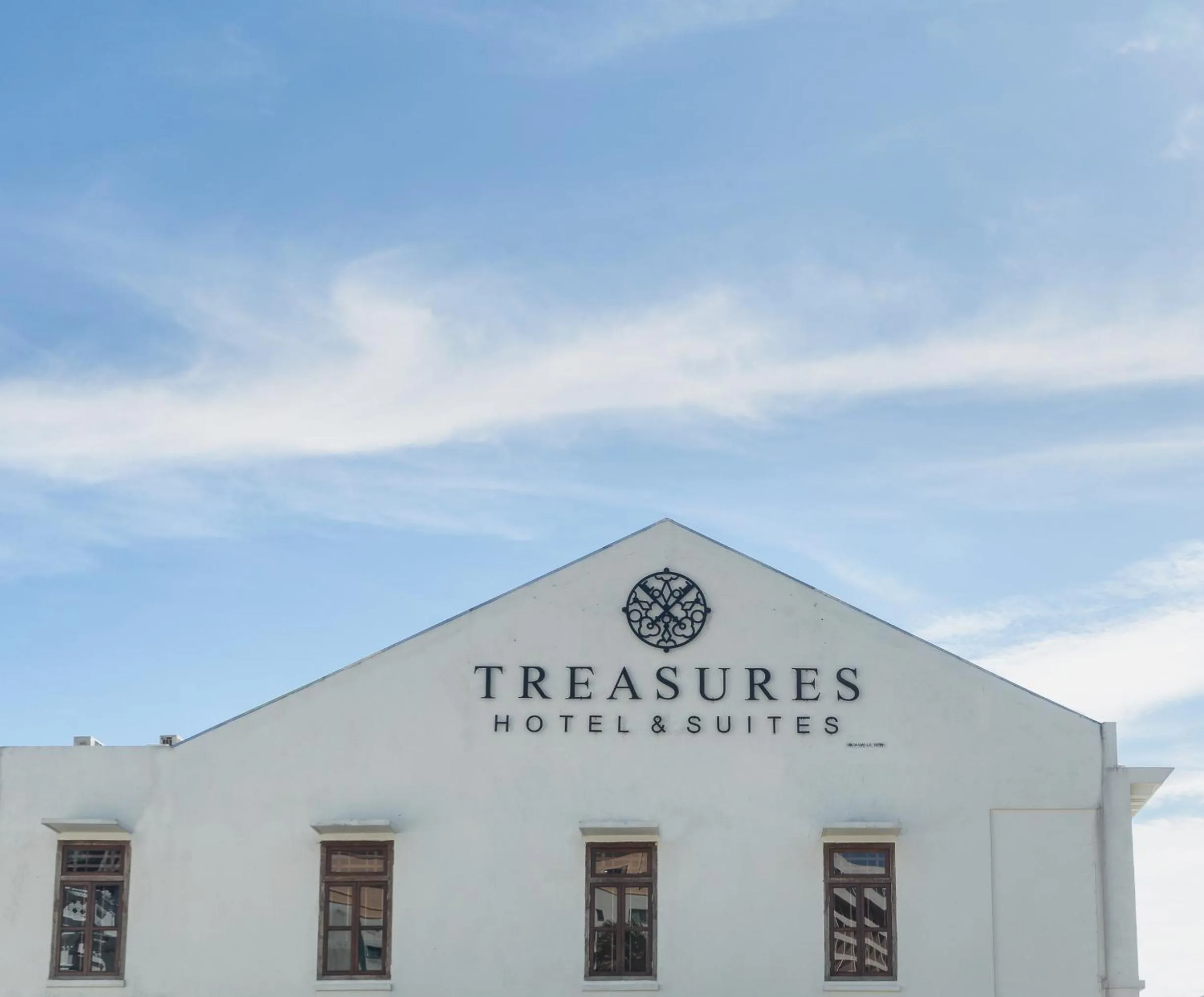 Property building in Treasures Hotel and Suites