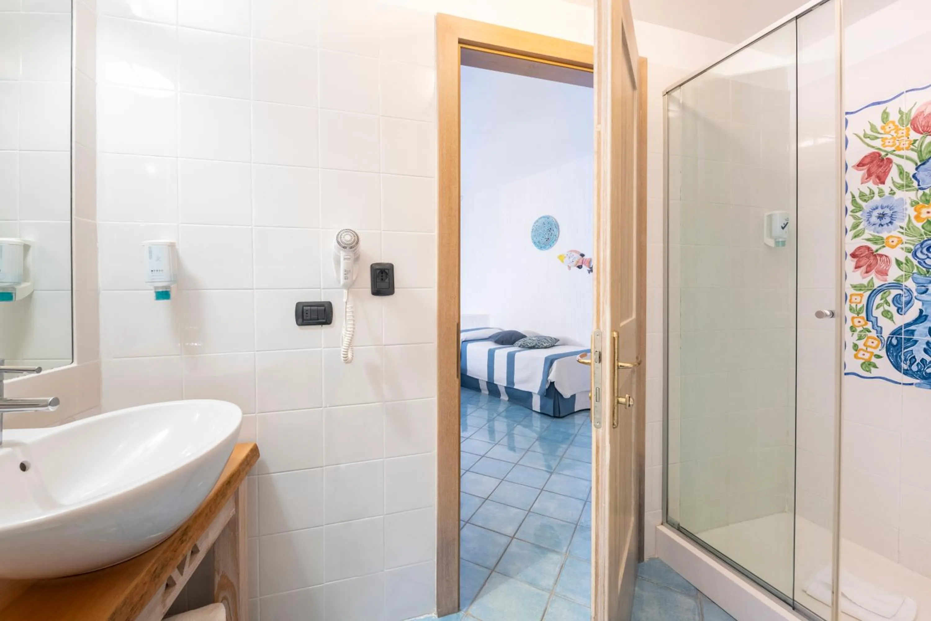 Bathroom in Hotel Resort & Spa Baia Caddinas