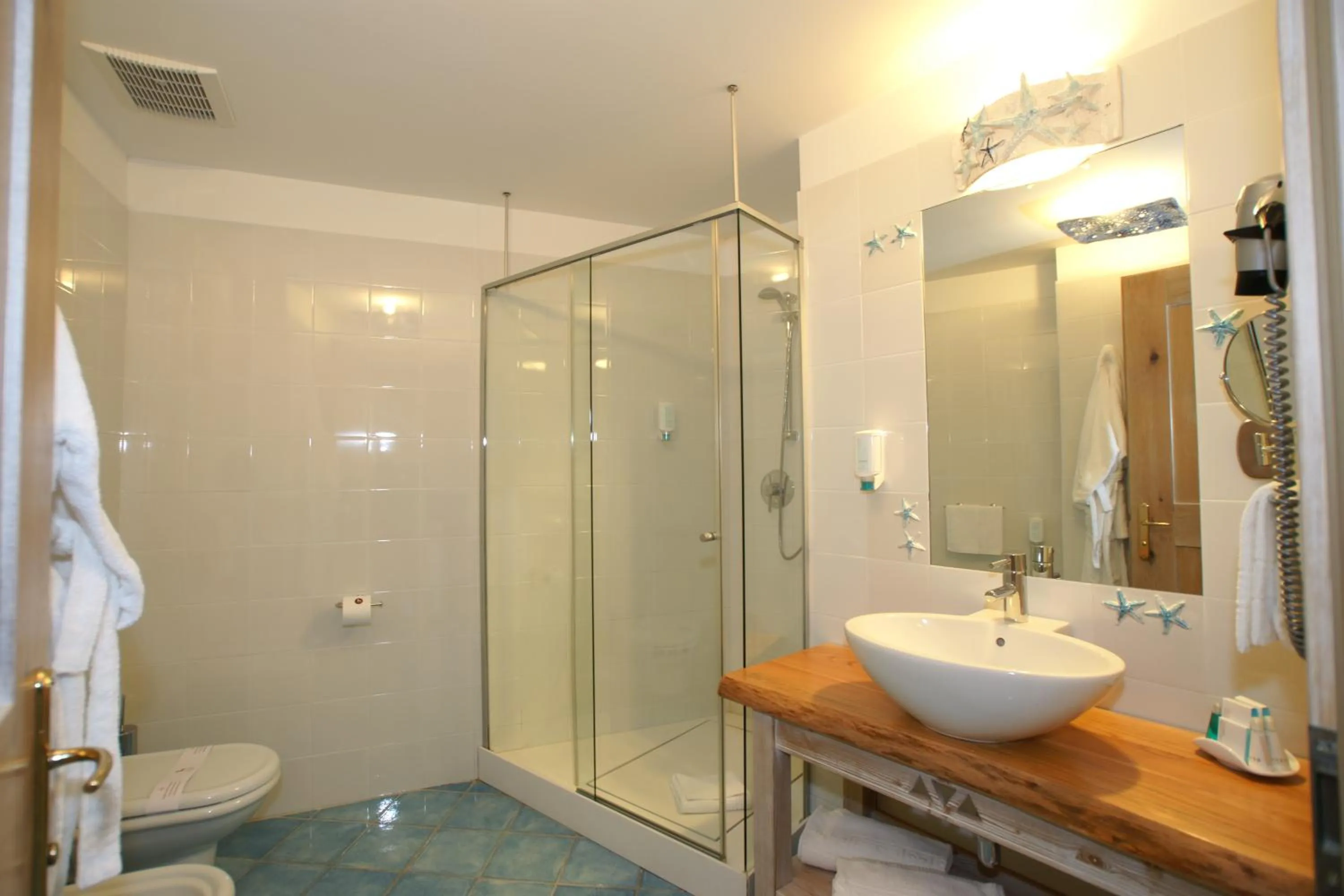 Bathroom in Hotel Resort & Spa Baia Caddinas