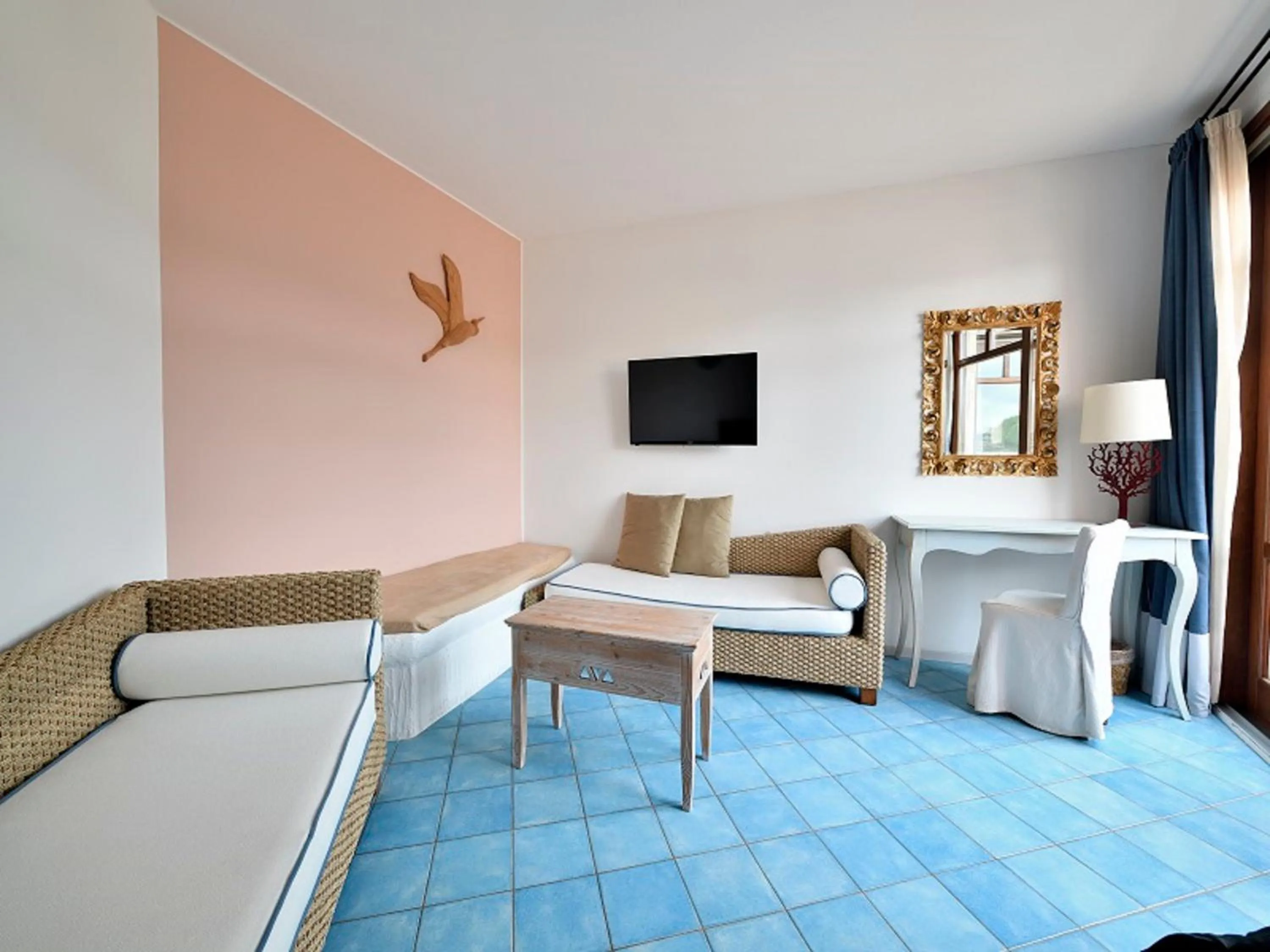 Living room in Hotel Resort & Spa Baia Caddinas