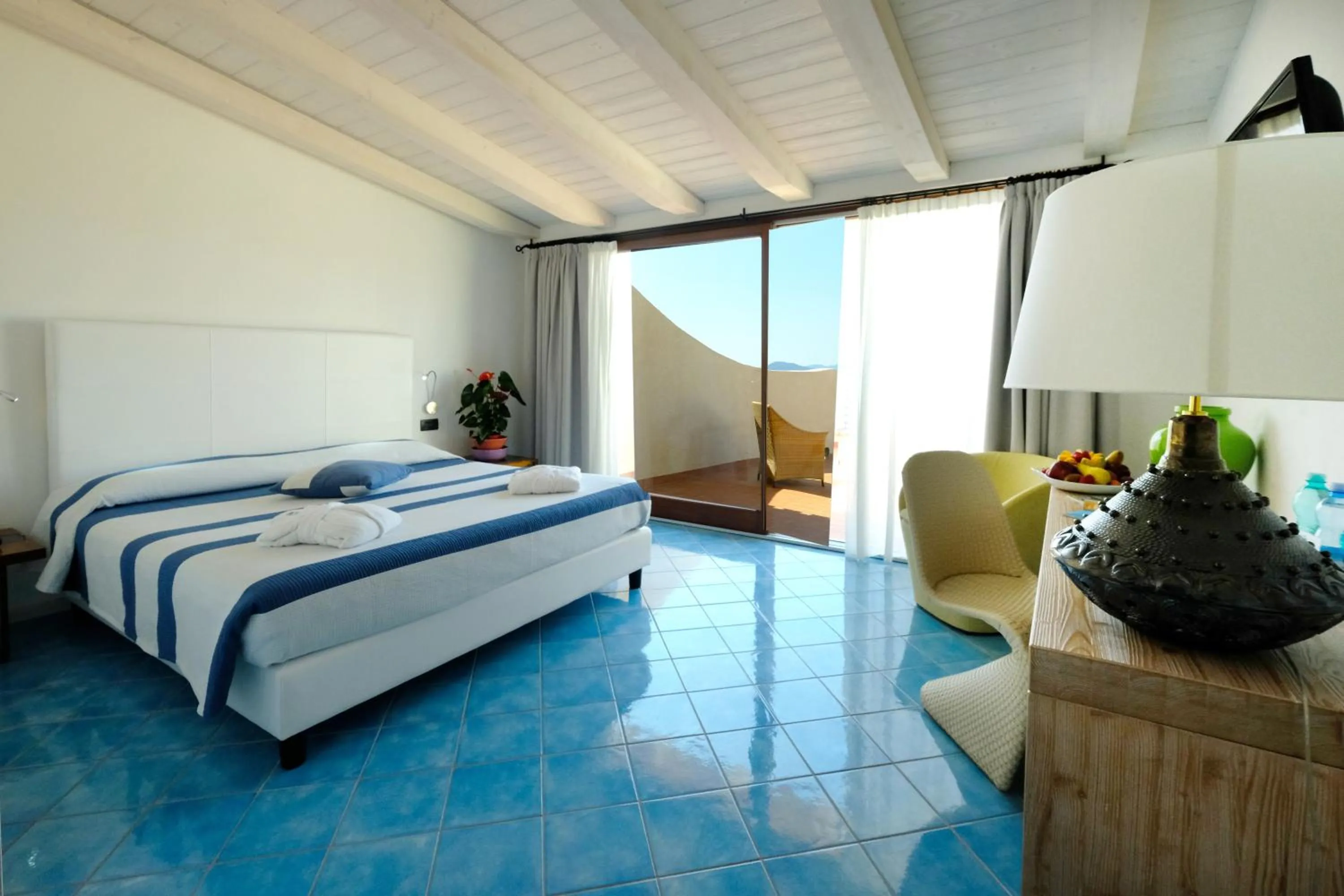 Photo of the whole room, Bed in Hotel Resort & Spa Baia Caddinas