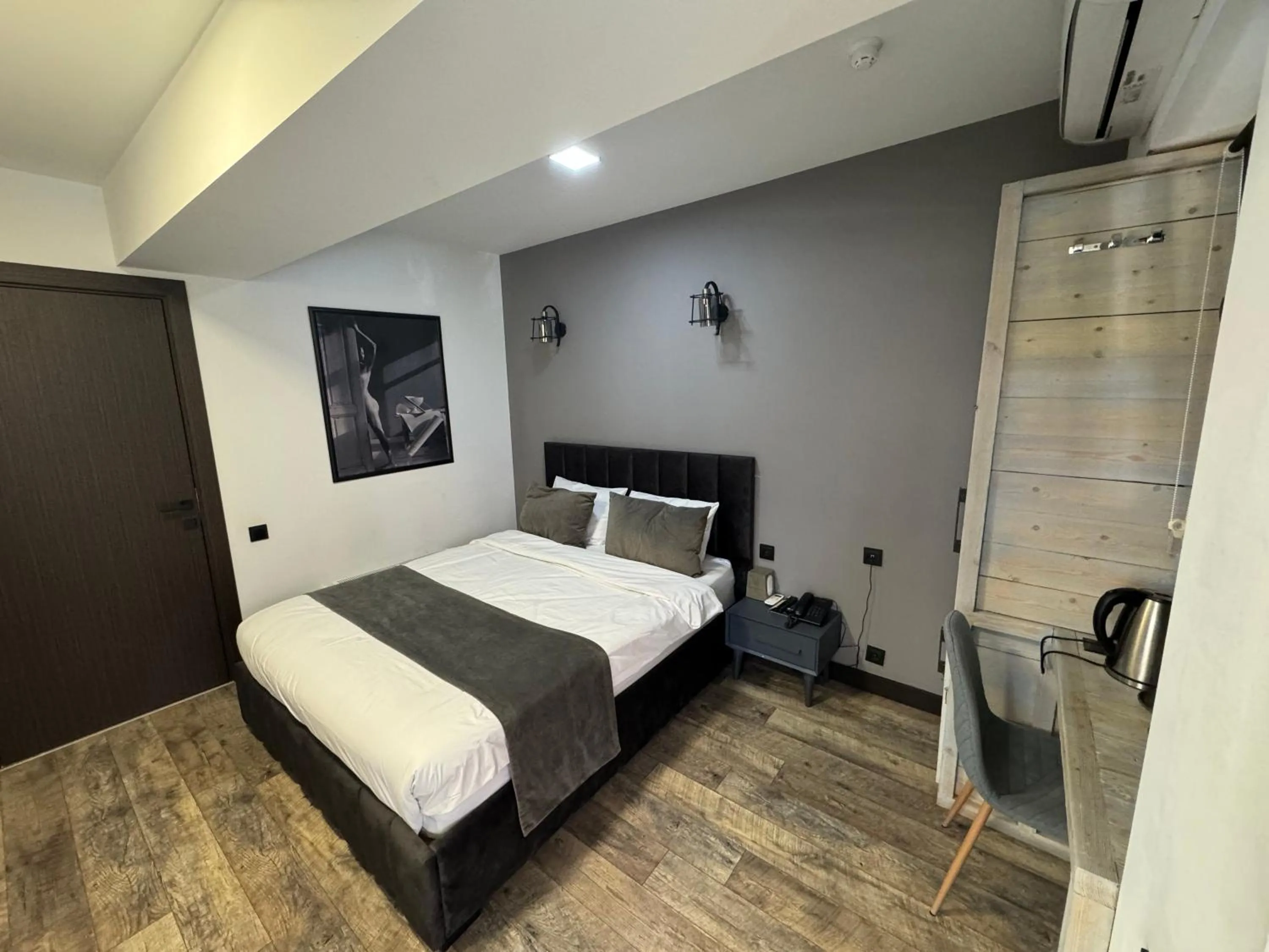 Bed in The Phoenix Boutique Hotel