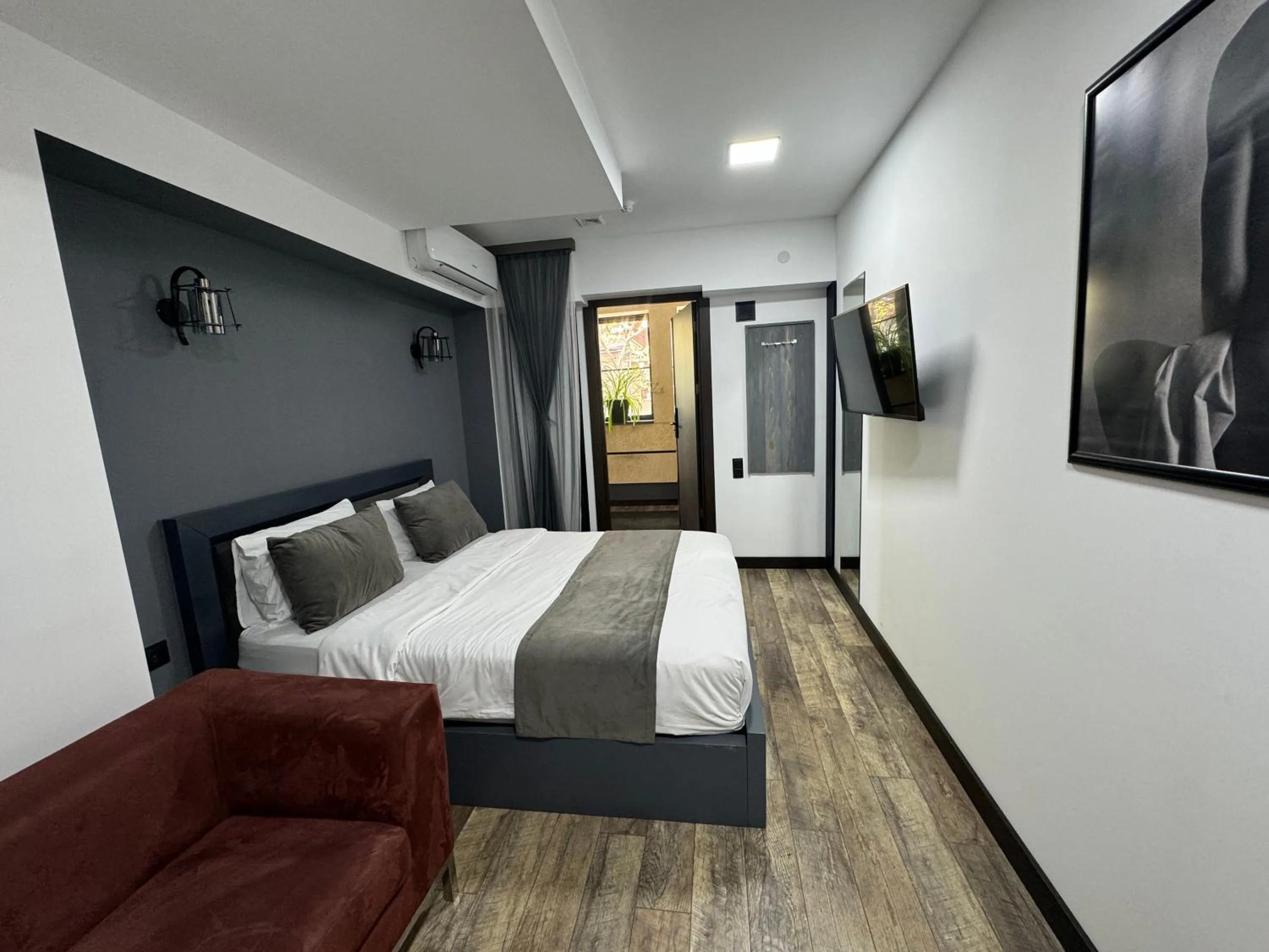 Bed in The Phoenix Boutique Hotel