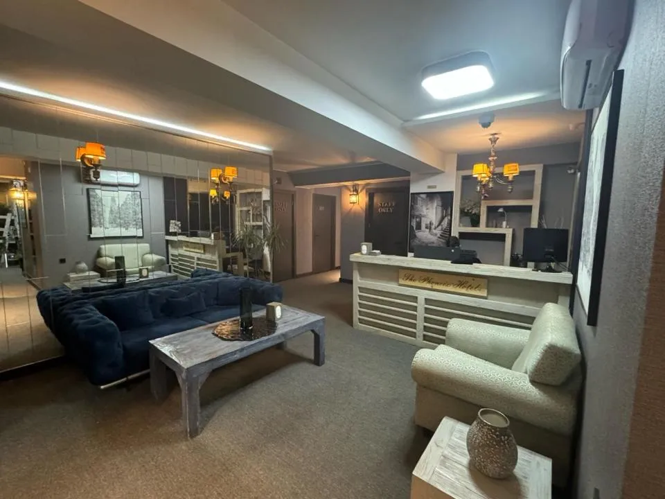 Seating area, Bed in The Phoenix Boutique Hotel