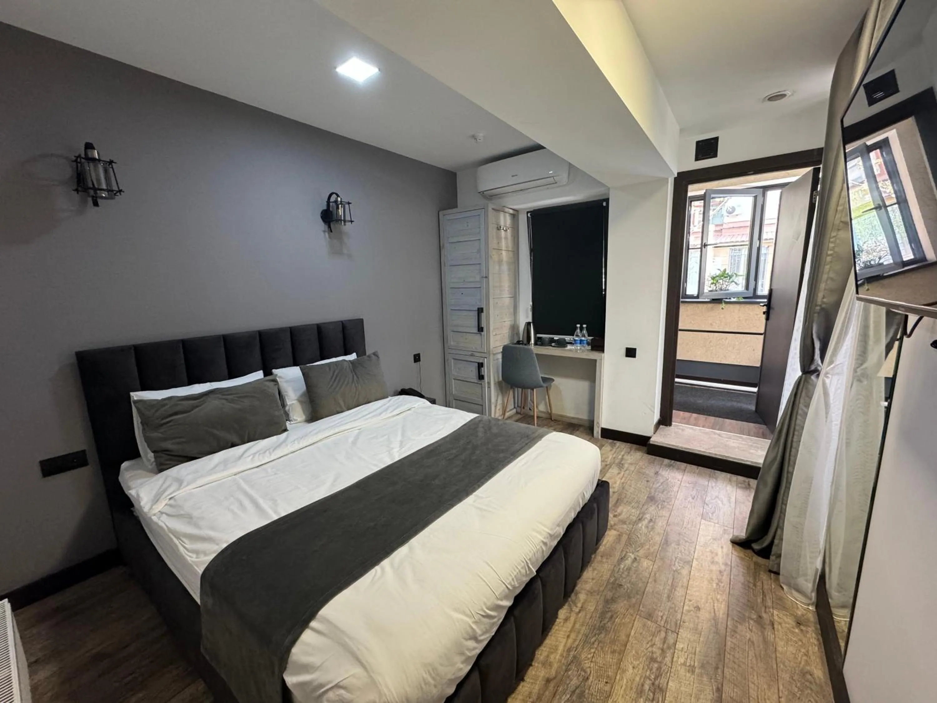 Bed in The Phoenix Boutique Hotel