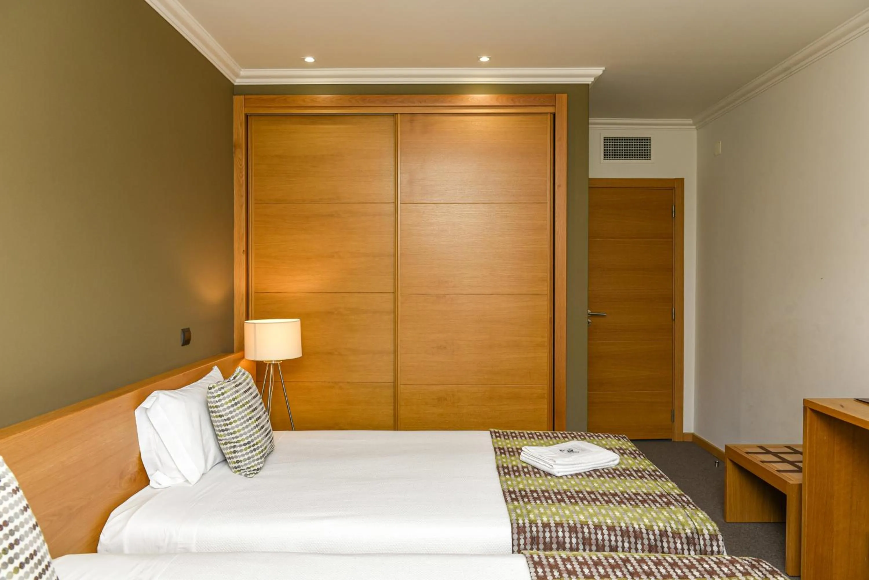 Bed in Dom Joao Hotel