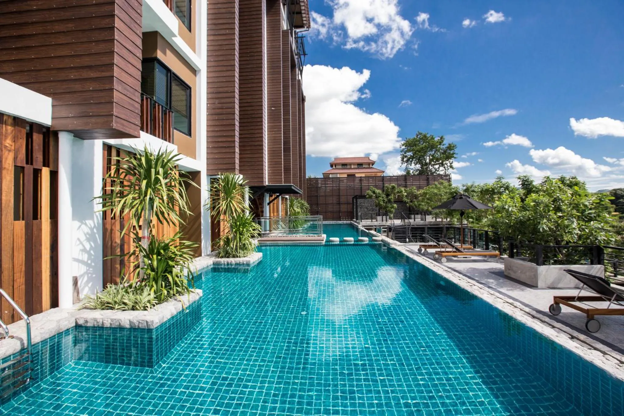 Swimming pool in Natee The Riverfront Hotel Kanchanaburi