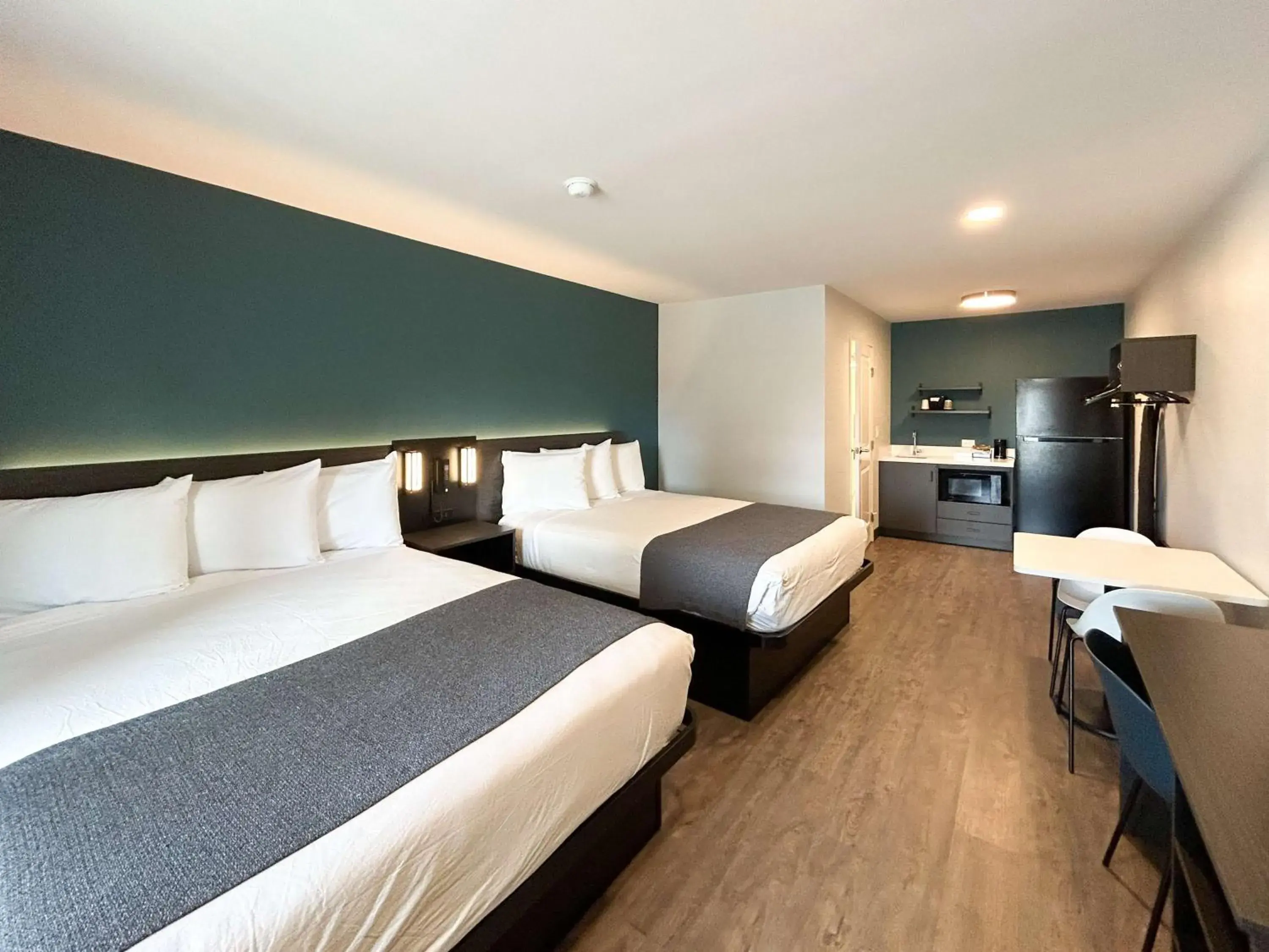 Queen Room with Two Queen Beds - Disability Access - Roll In Shower in Studio 6 Corona, CA West Queen Room with Two Queen Beds - Disability Access - Roll In Shower in Studio 6 Corona, CA West