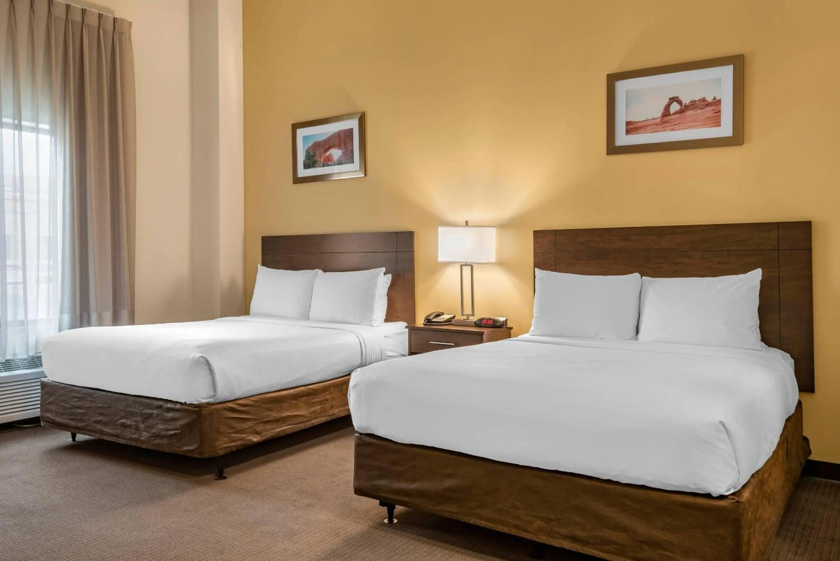 Bedroom, Bed in MainStay Suites Moab near Arches National Park