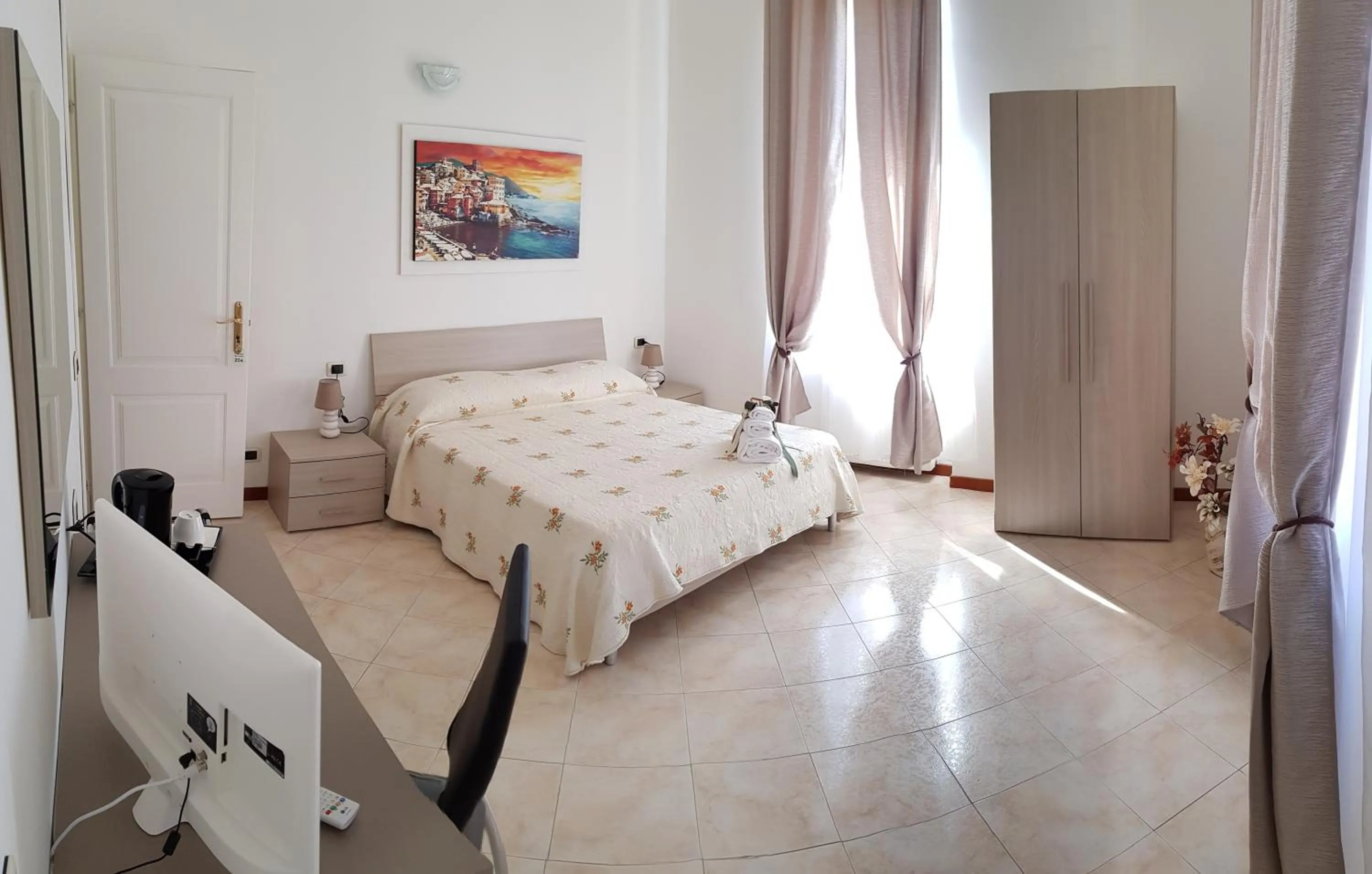 Bed in Il Giardino dei Limoni Room & Apartments