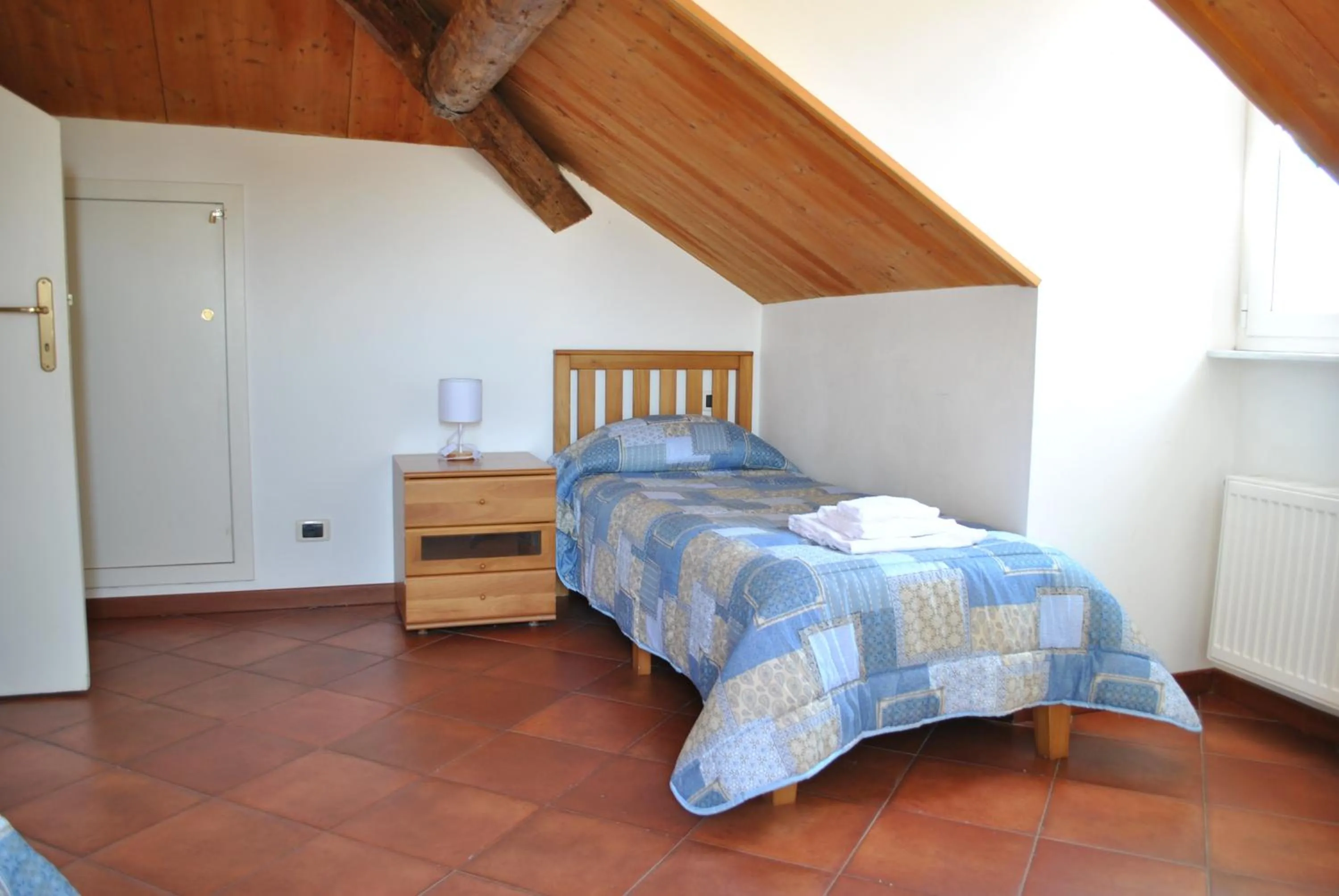 Bed in Il Giardino dei Limoni Room & Apartments