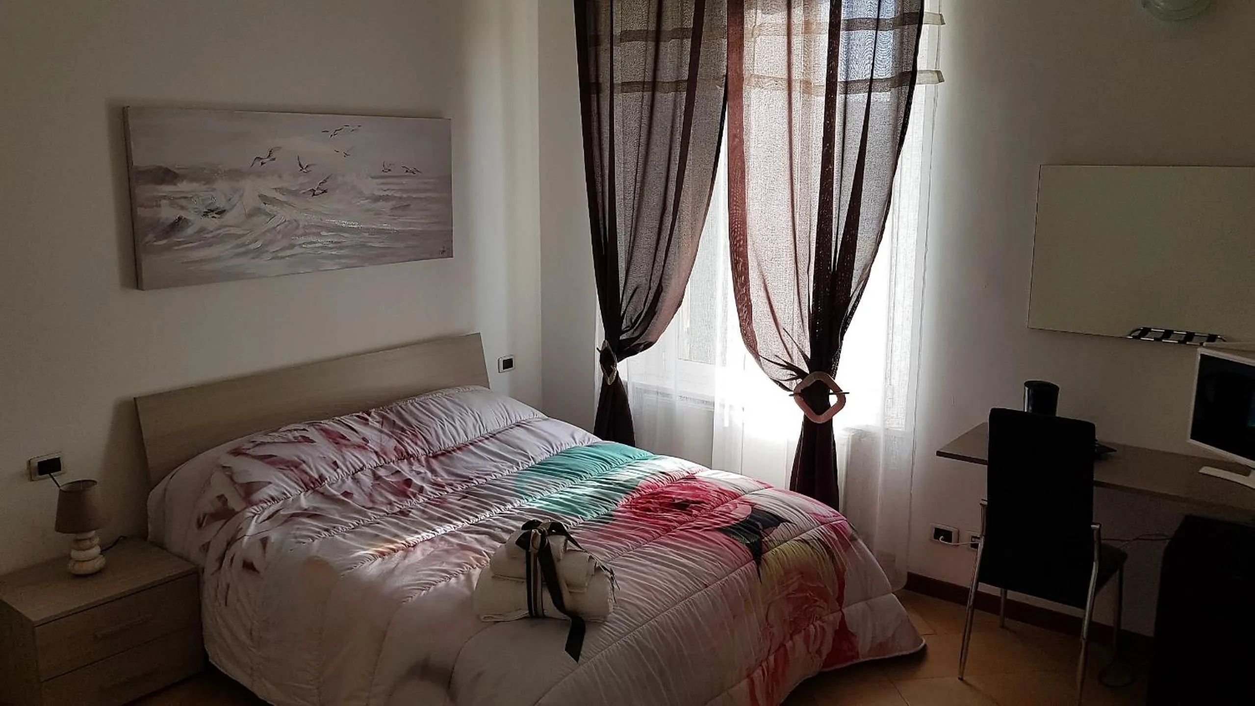 Bed in Il Giardino dei Limoni Room & Apartments