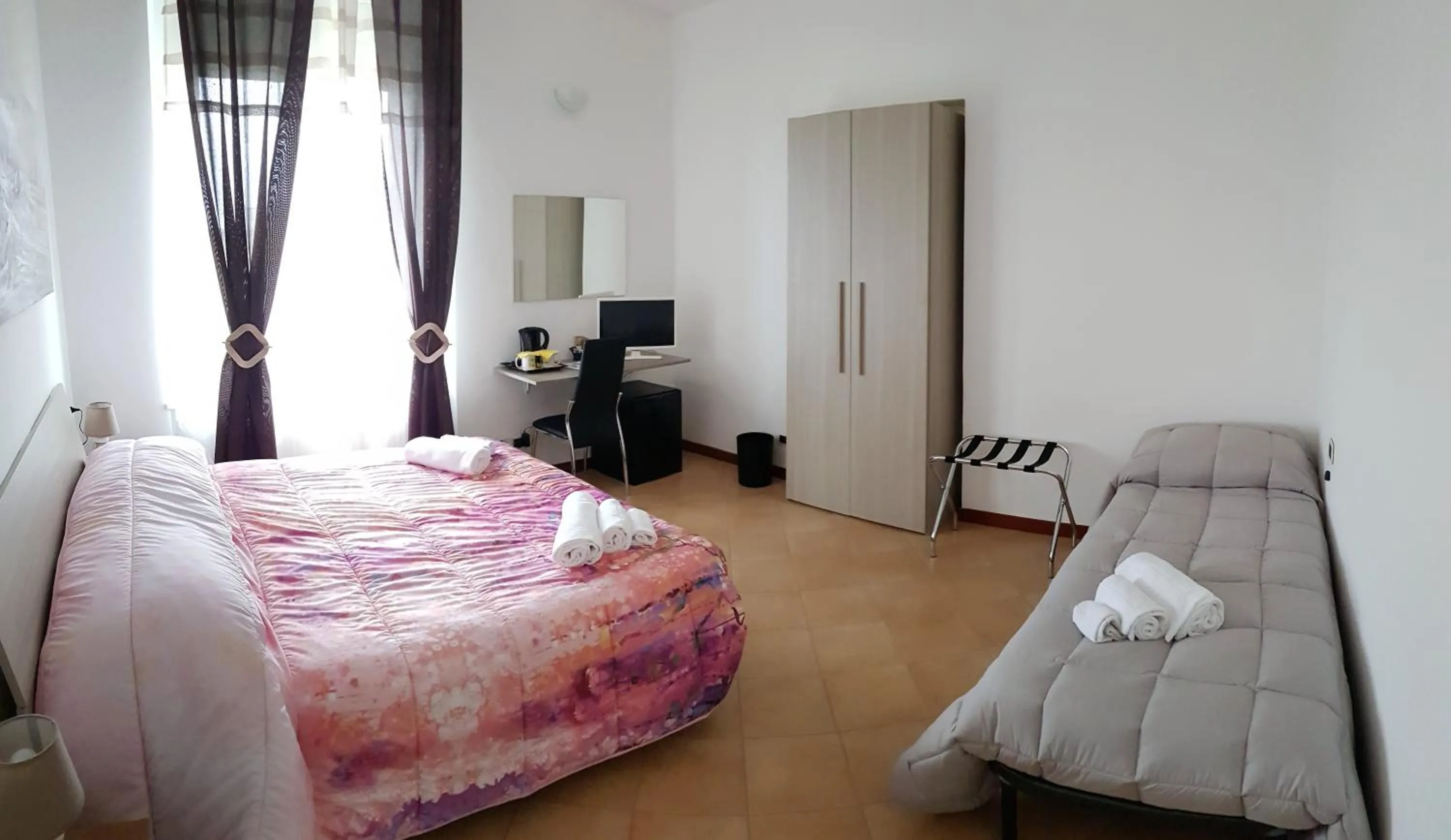 Bed in Il Giardino dei Limoni Room & Apartments