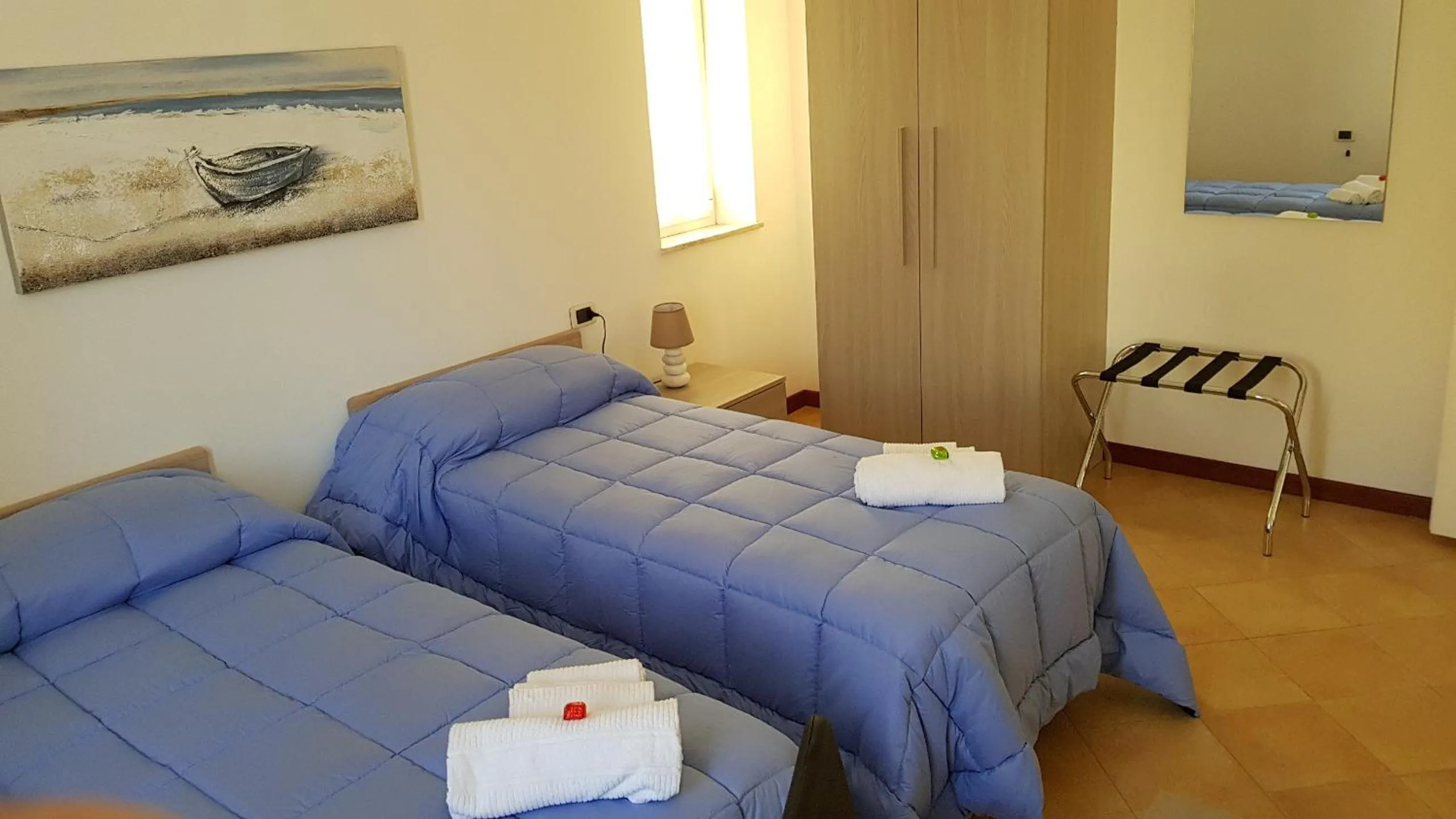 Photo of the whole room, Bed in Il Giardino dei Limoni Room & Apartments