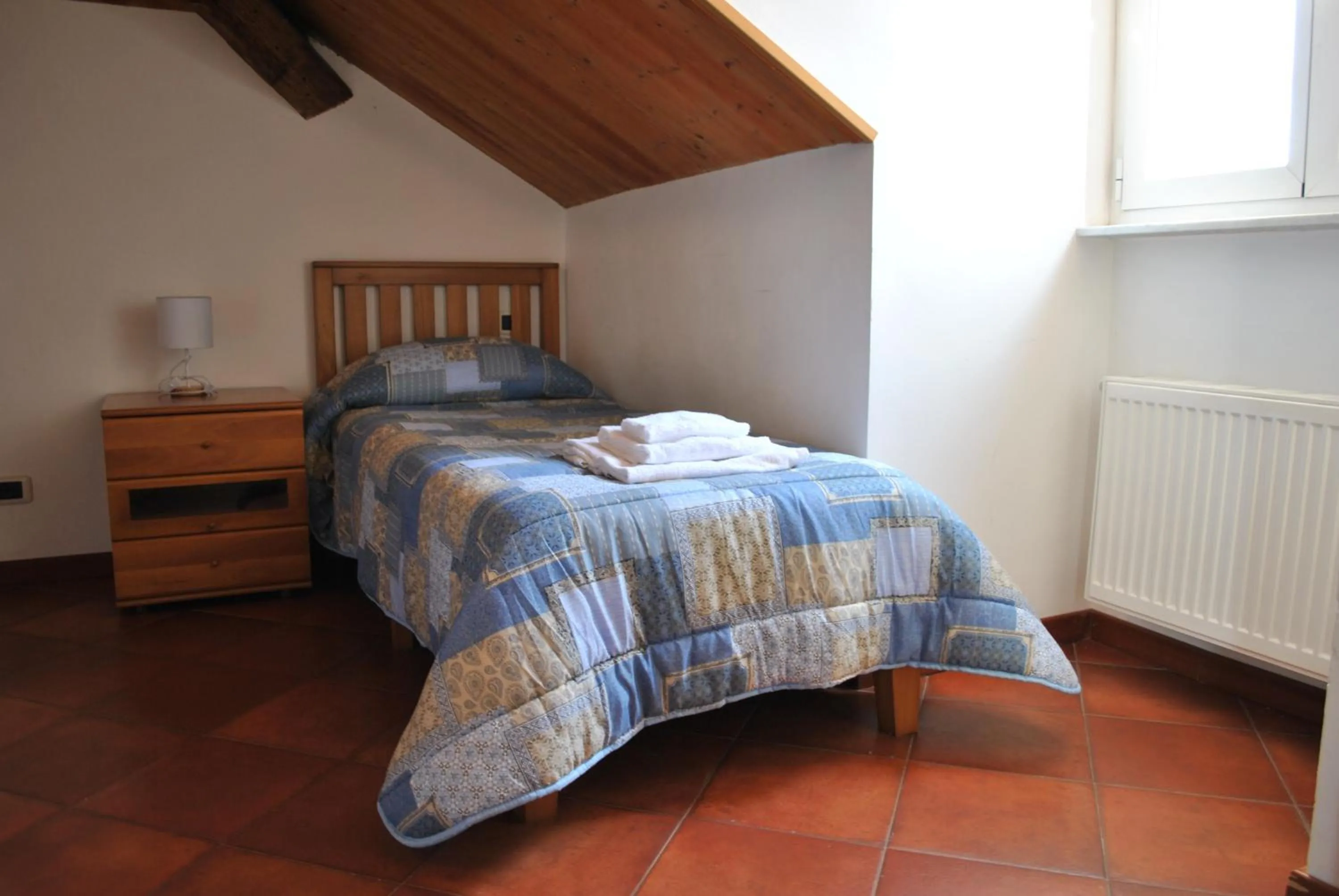 Bed in Il Giardino dei Limoni Room & Apartments