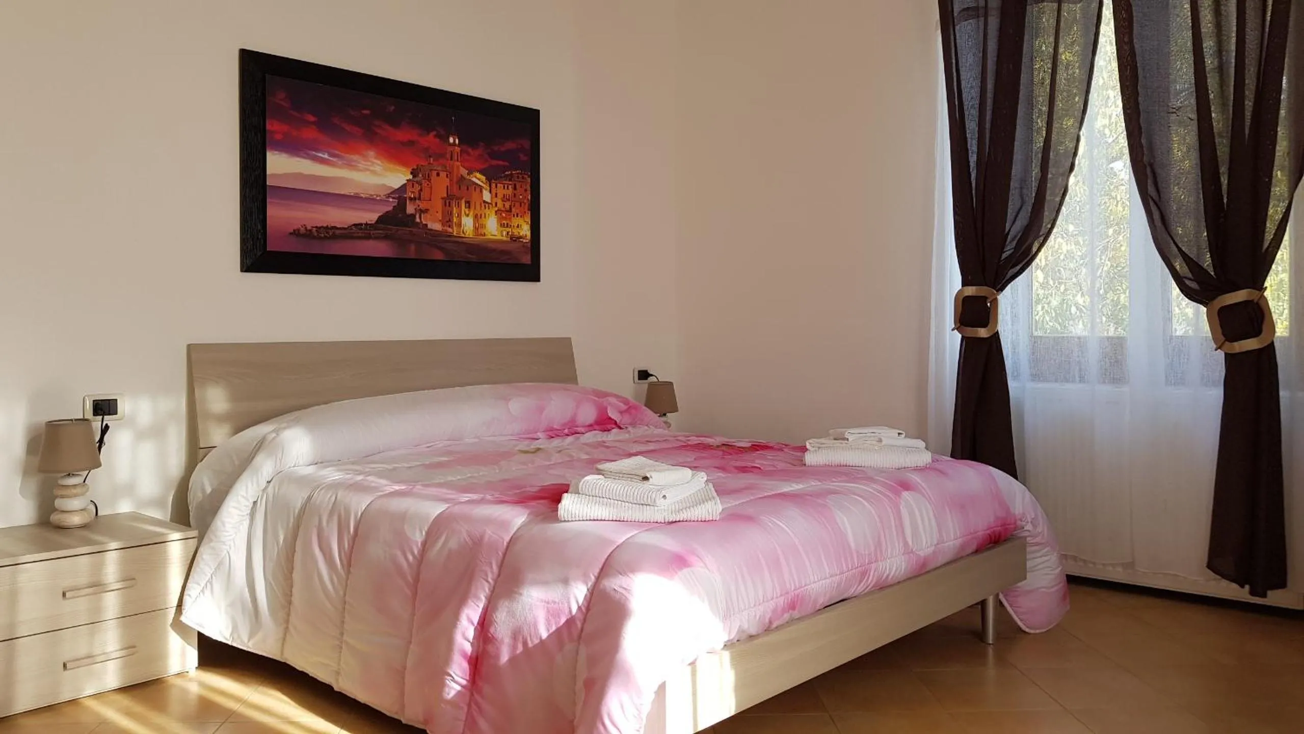 Bed in Il Giardino dei Limoni Room & Apartments