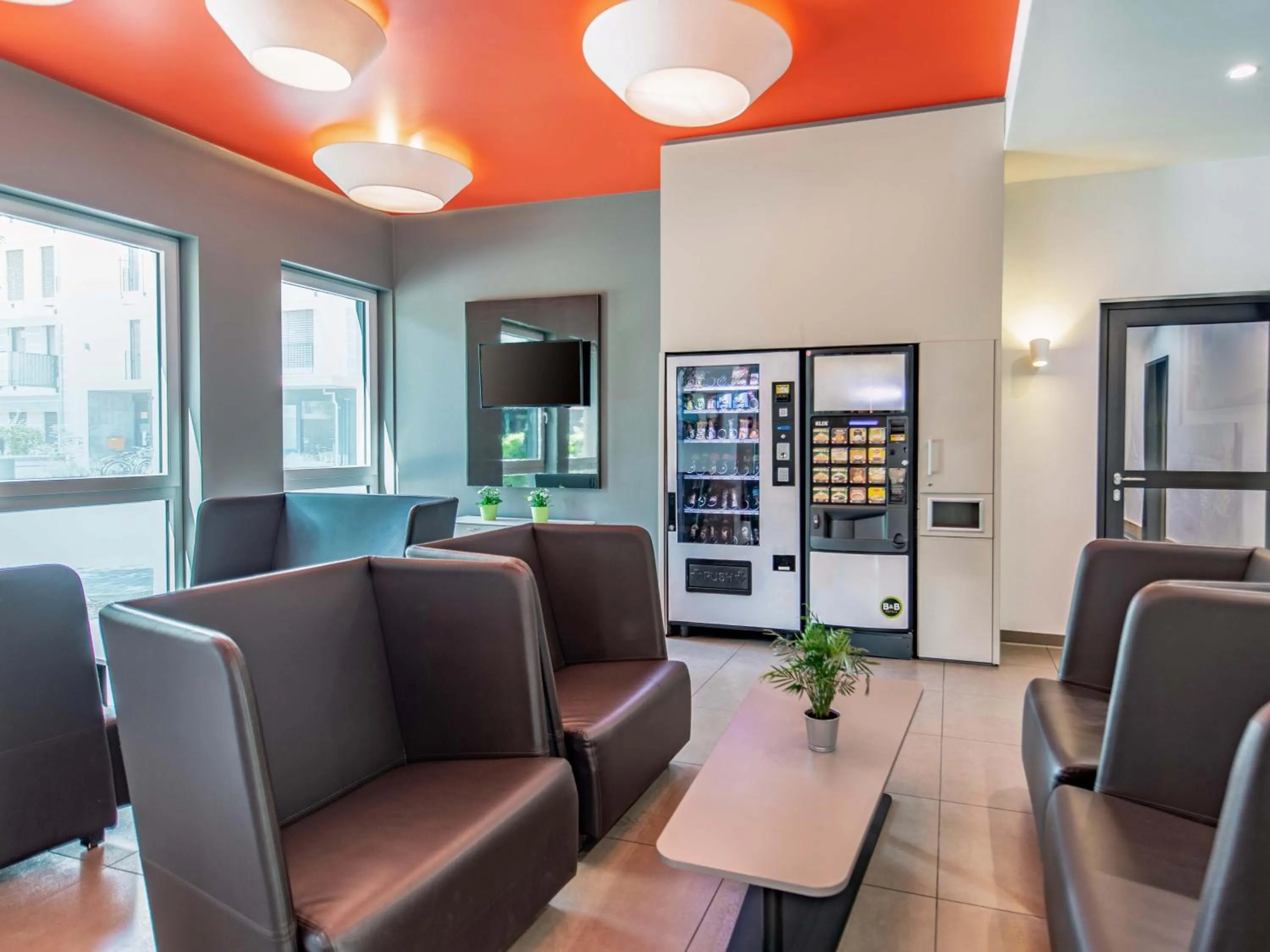 Lobby or reception in B&B Hotel Neu-Ulm