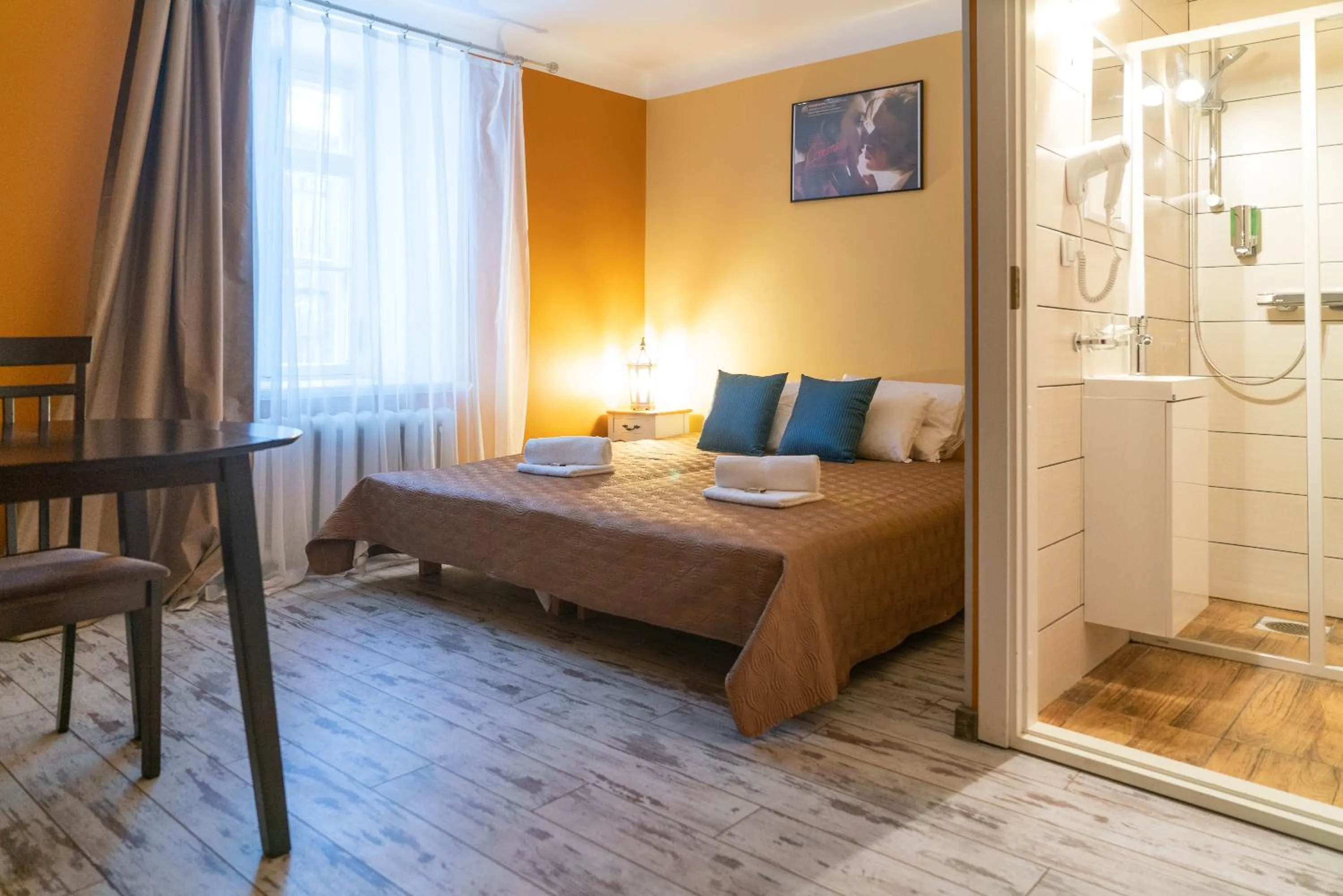 Bed in Godart Rooms Guesthouse