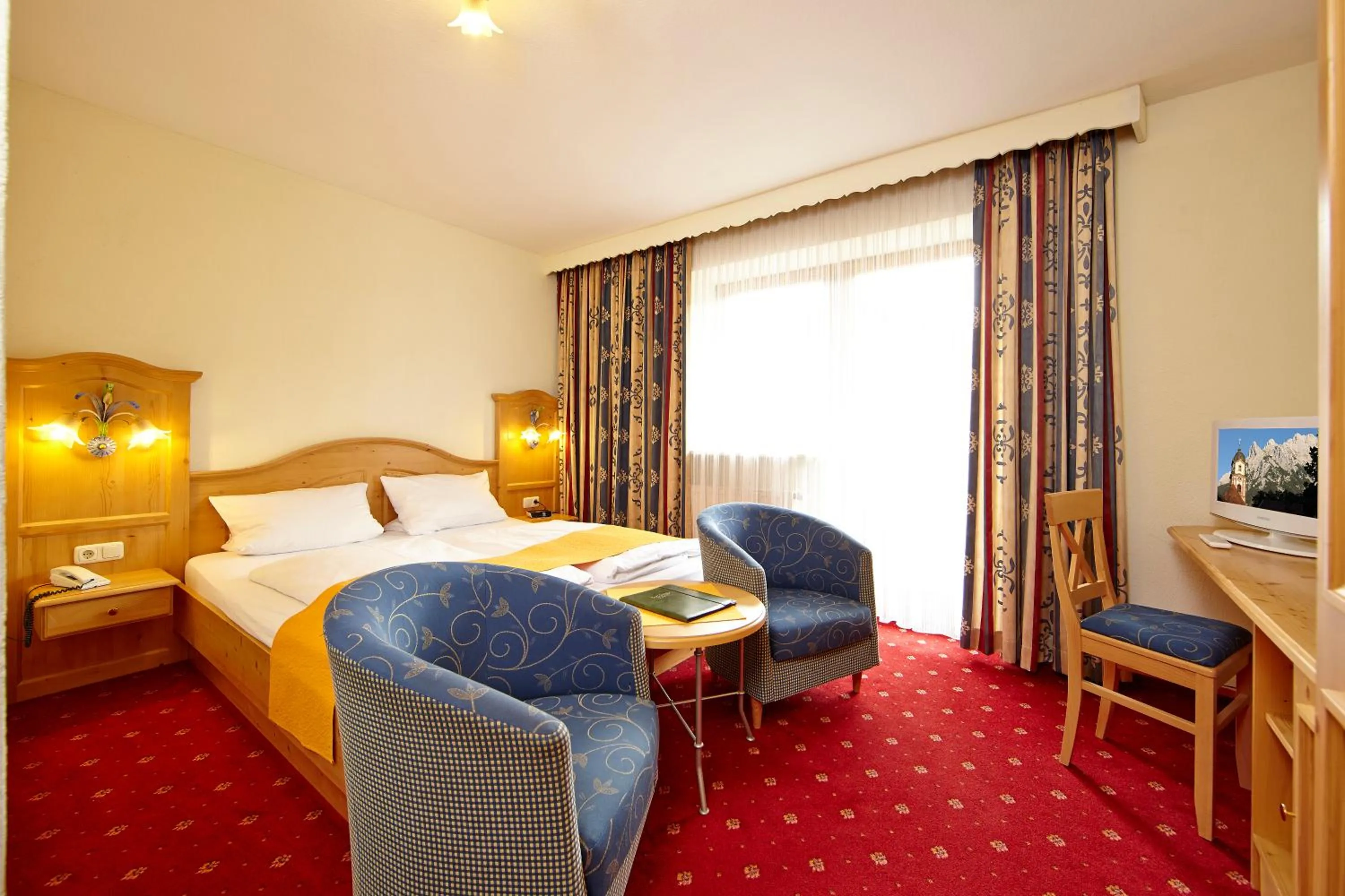 Photo of the whole room, Bed in Alpenhotel Rieger