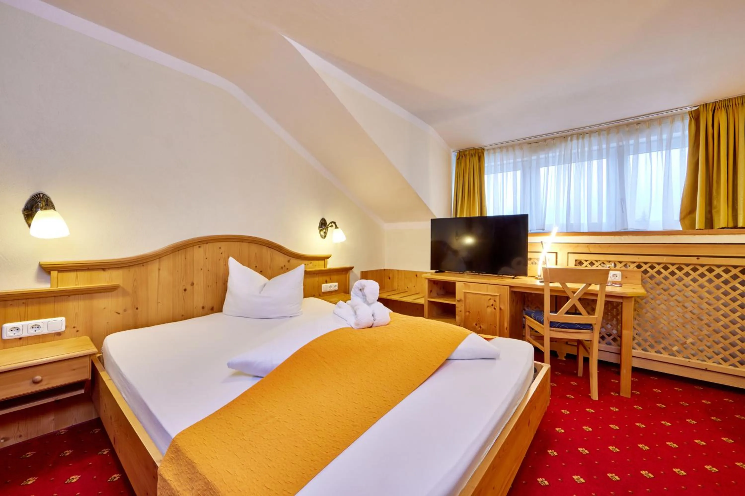 TV and multimedia, Bed in Alpenhotel Rieger