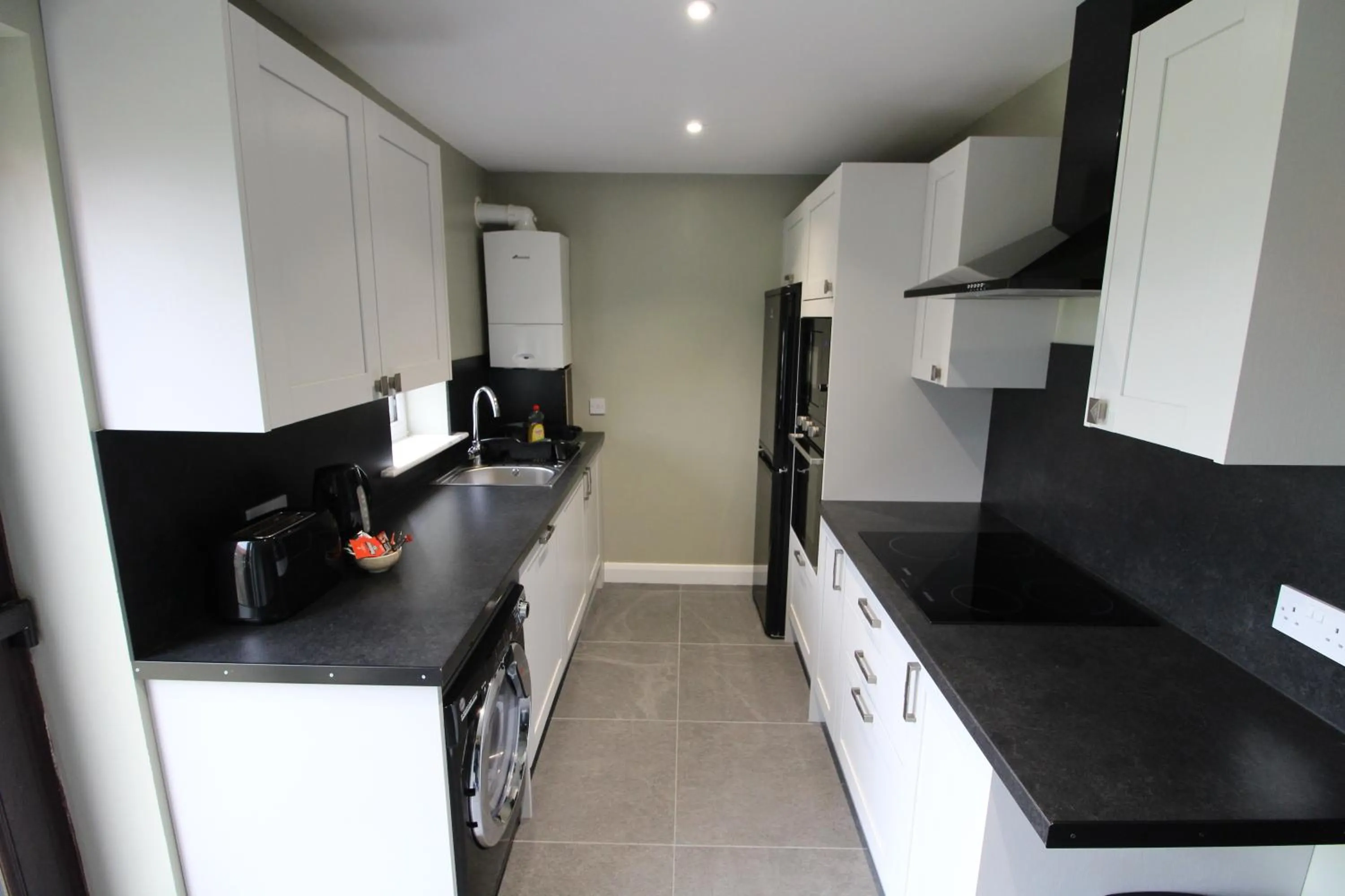 kitchen in Plawsworth Hall Serviced Cottages and Apartments