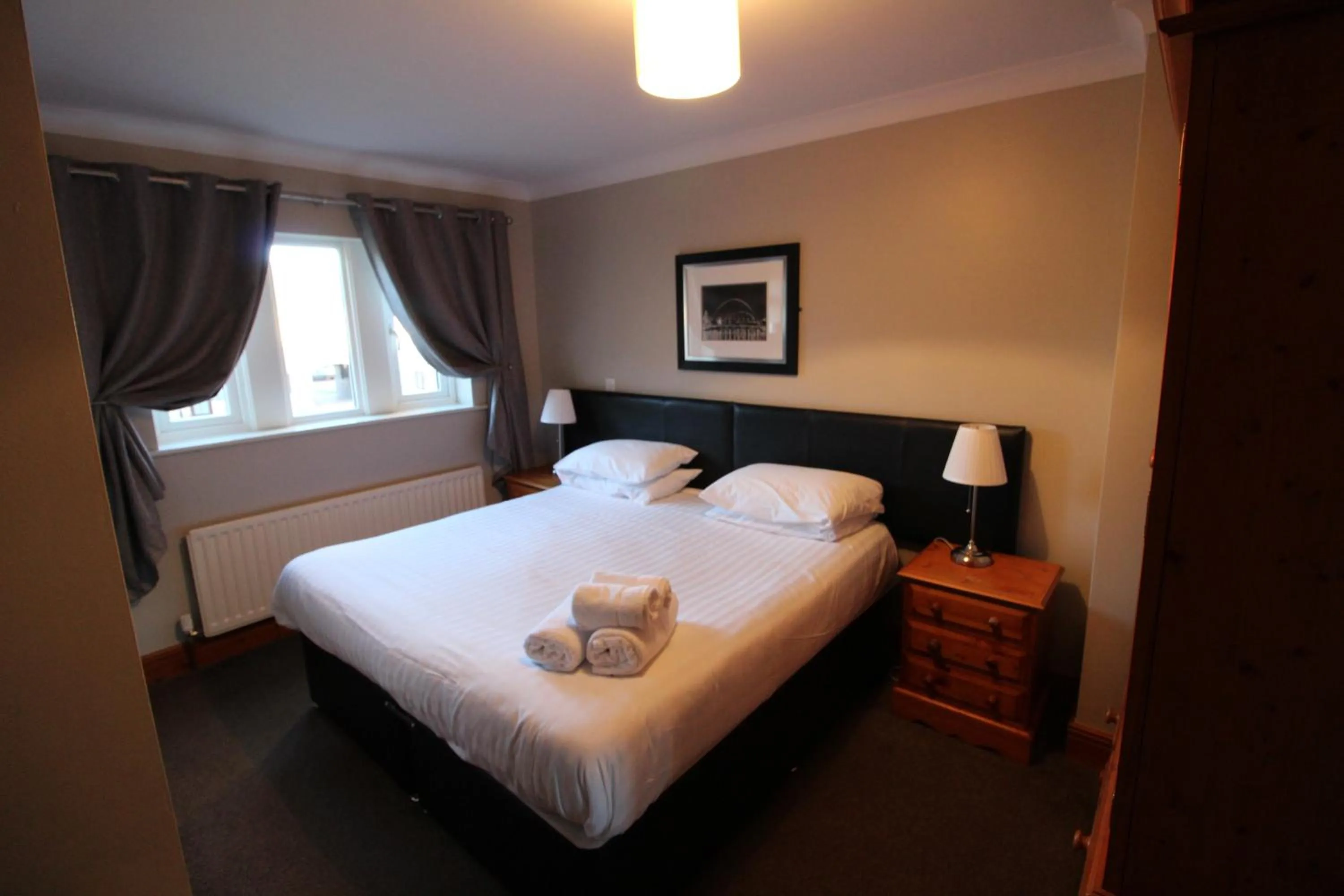 Bedroom, Bed in Plawsworth Hall Serviced Cottages and Apartments