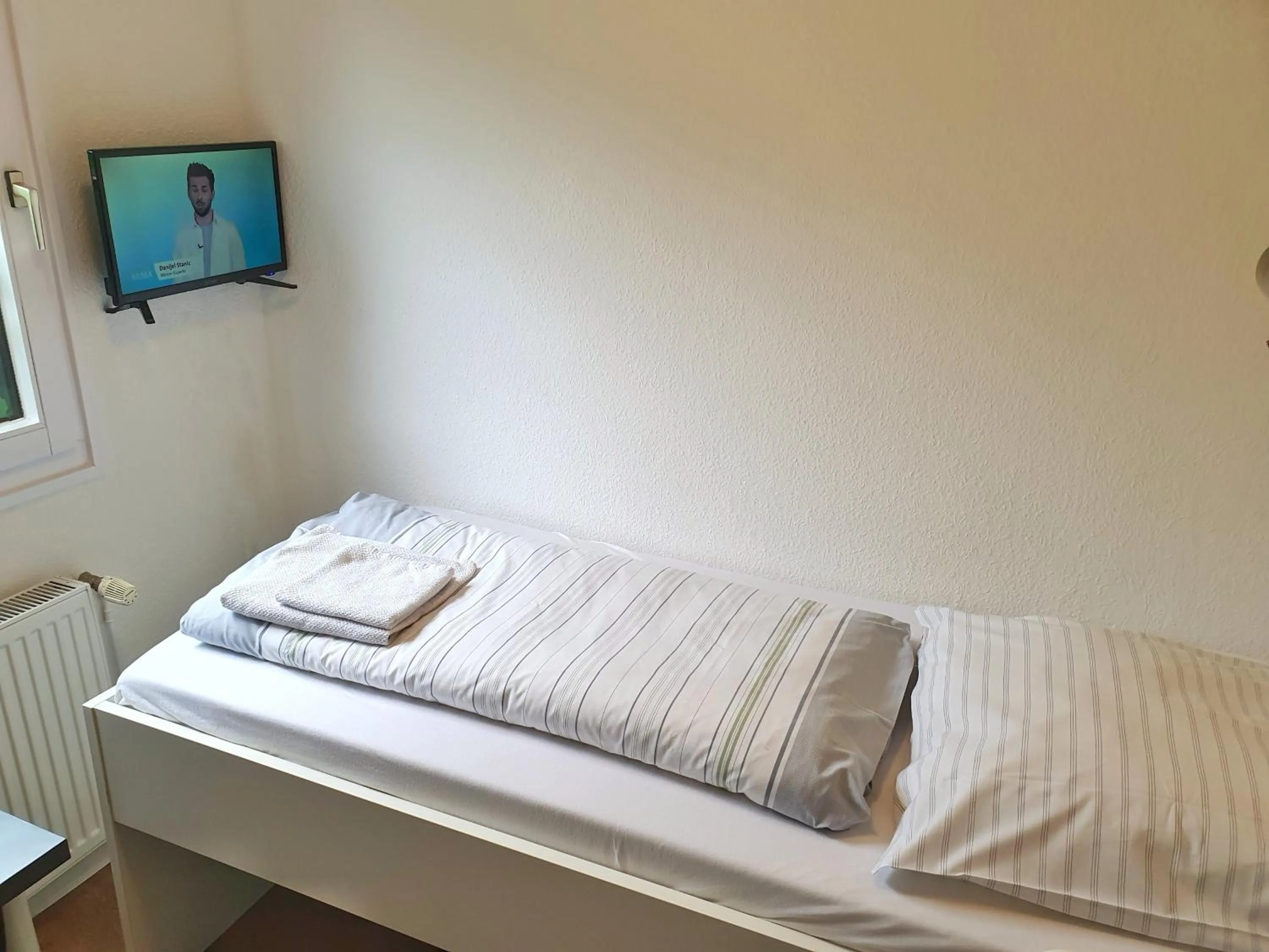 Bed in Aparthotel Jonas