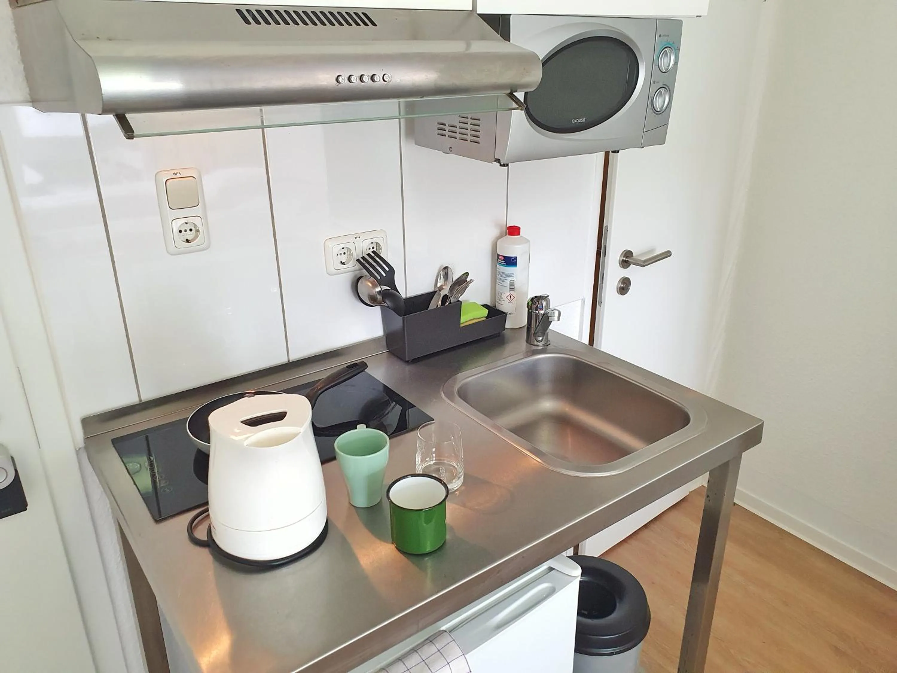 Kitchen or kitchenette in Aparthotel Jonas