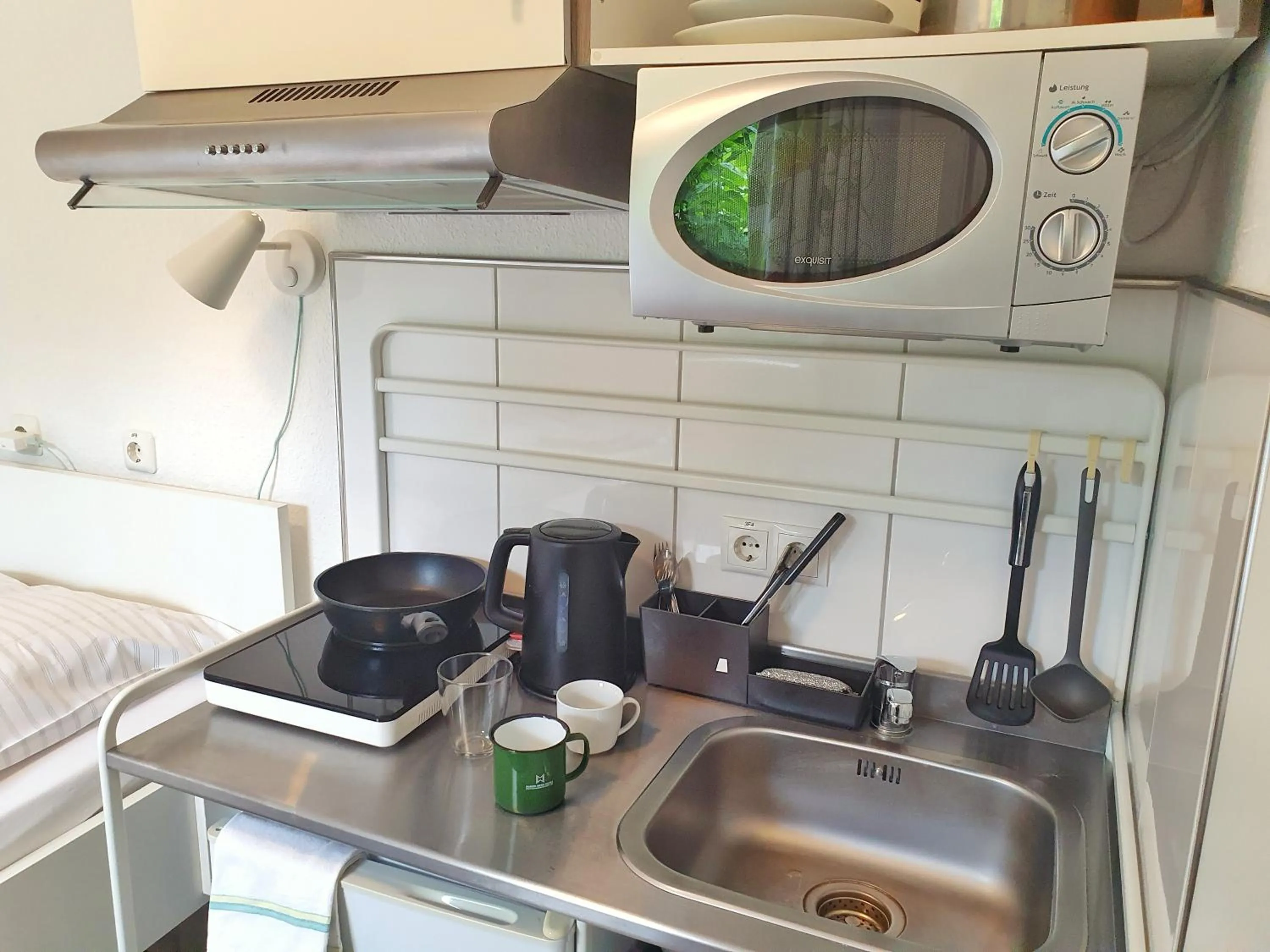 Kitchen or kitchenette in Aparthotel Jonas