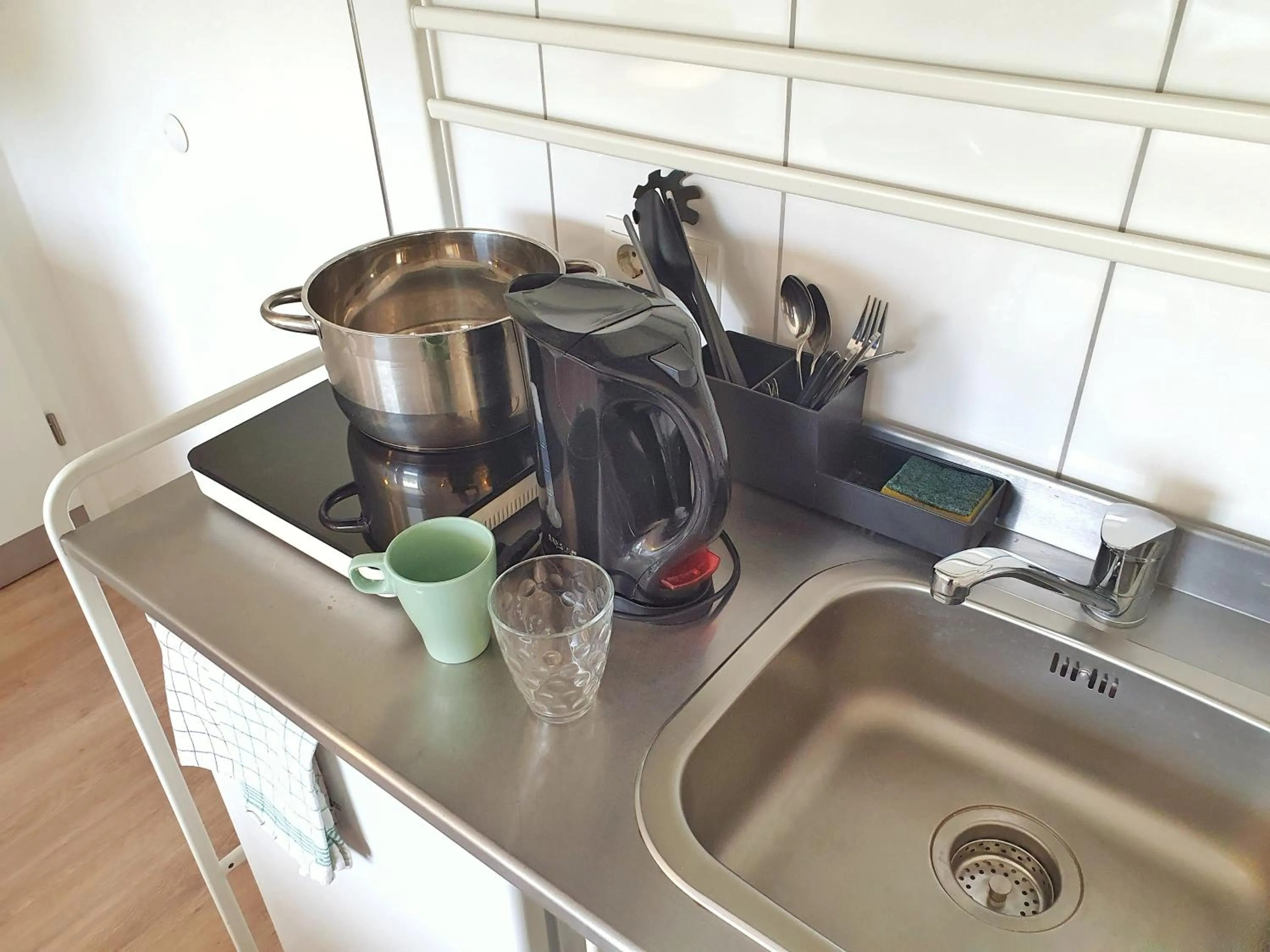 Kitchen or kitchenette in Aparthotel Jonas