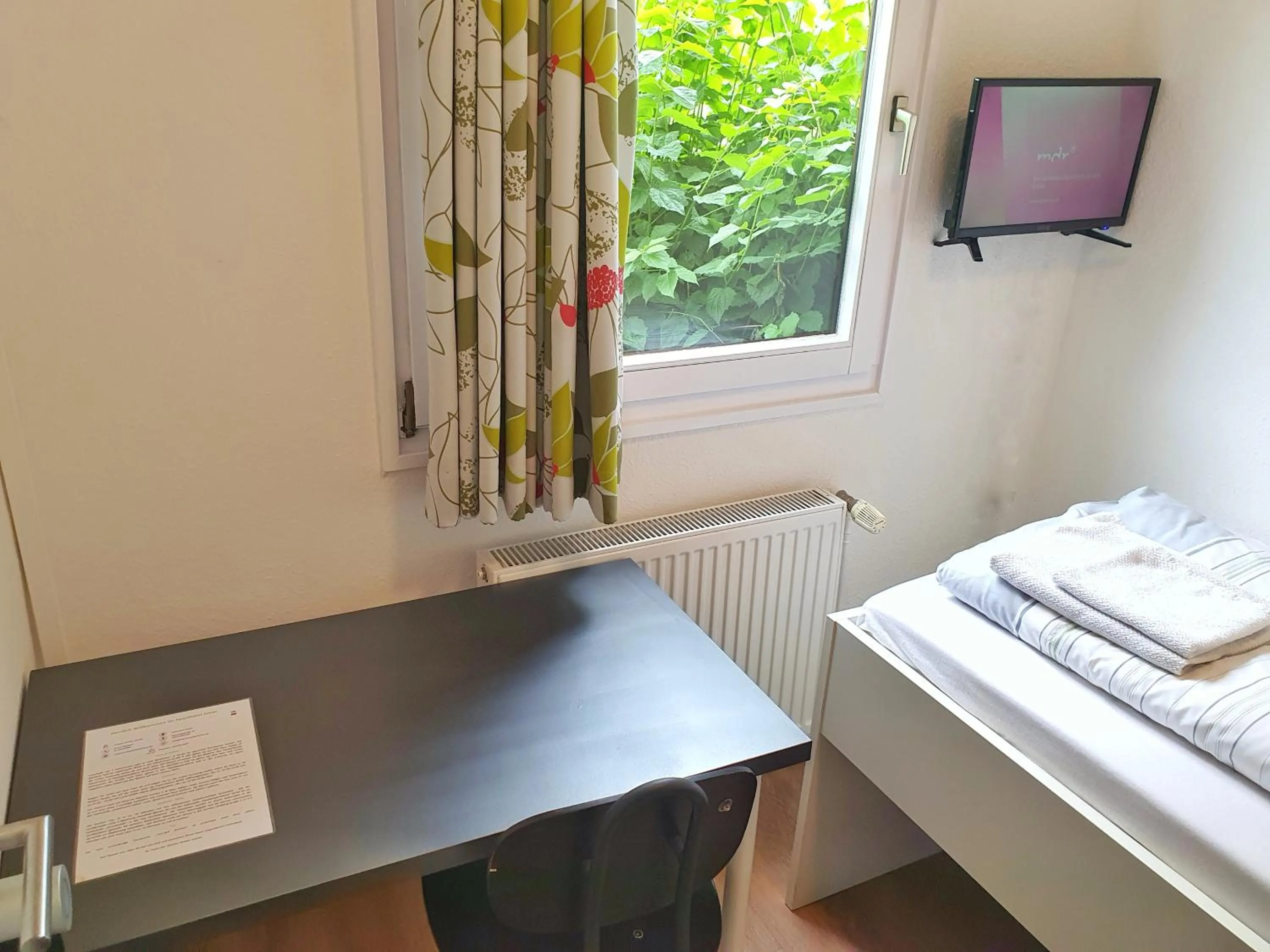 Bed in Aparthotel Jonas