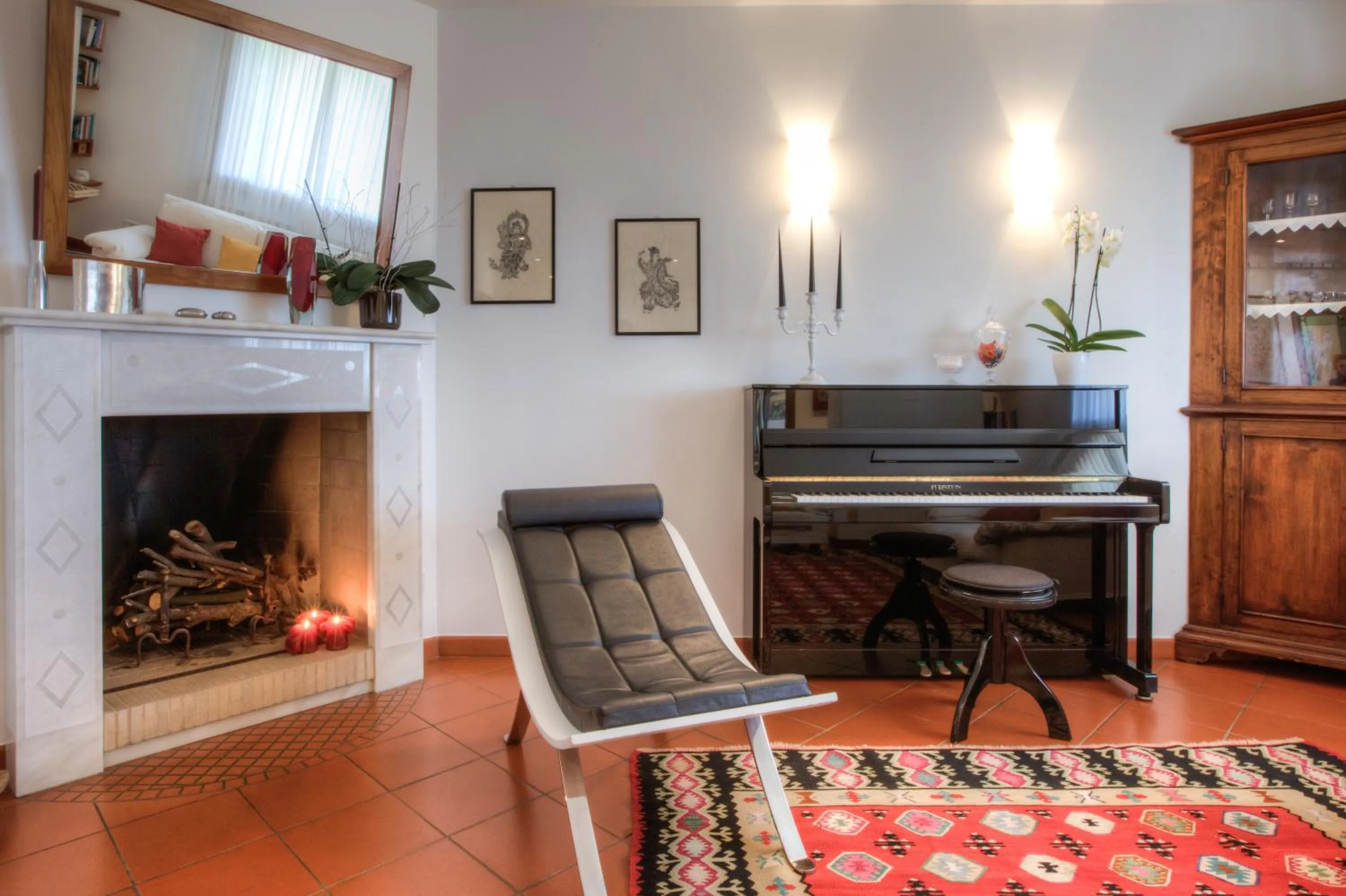 Communal lounge/ TV room in B&B Maison Il Melograno