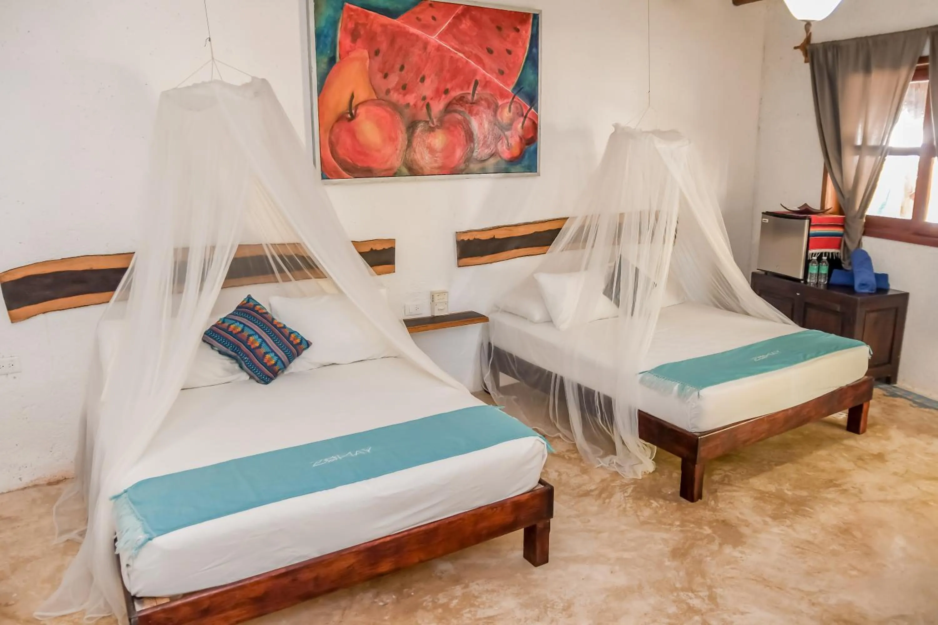 Bed in Zomay Beachfront Holbox