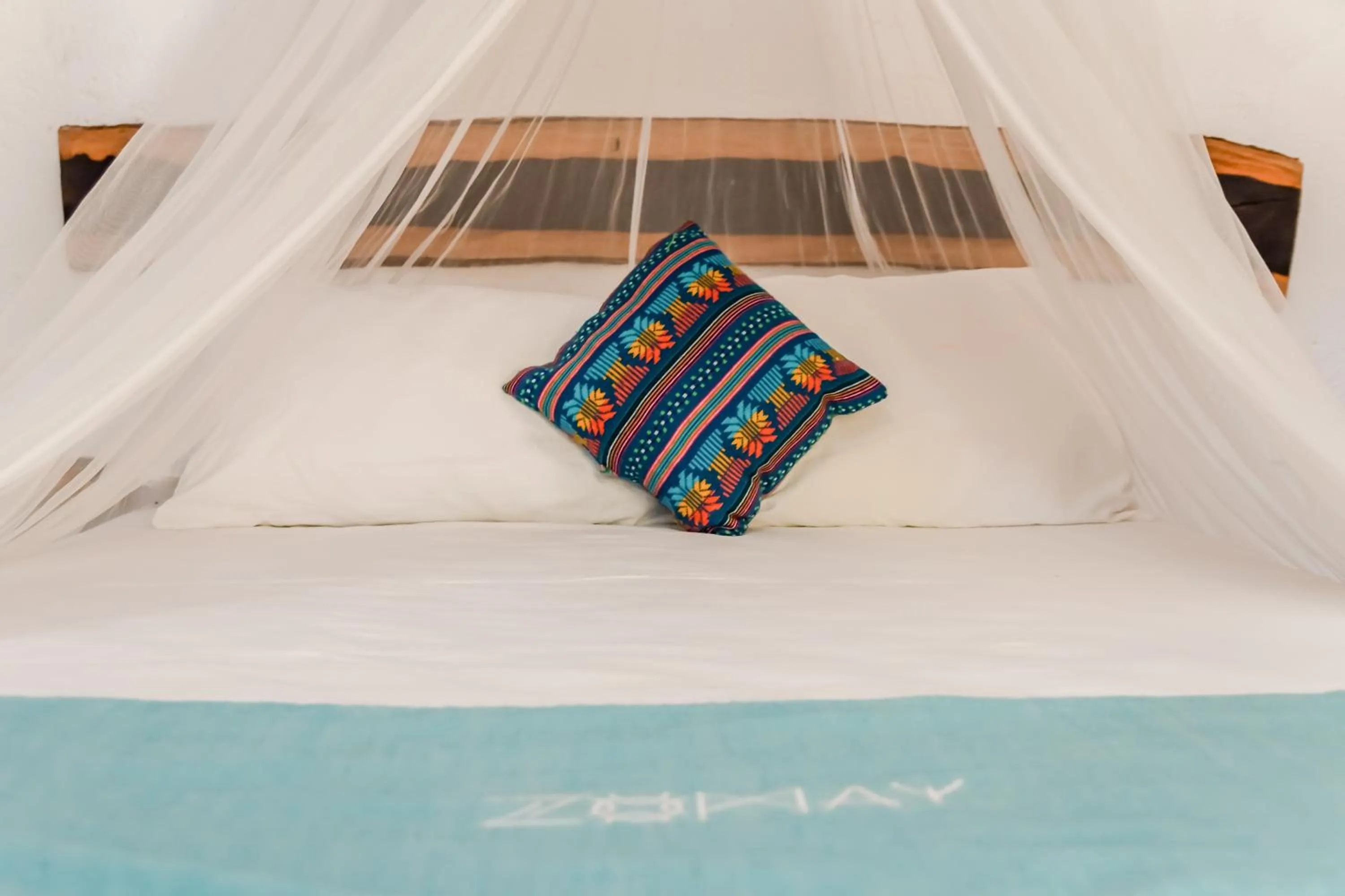 Bed in Zomay Beachfront Holbox