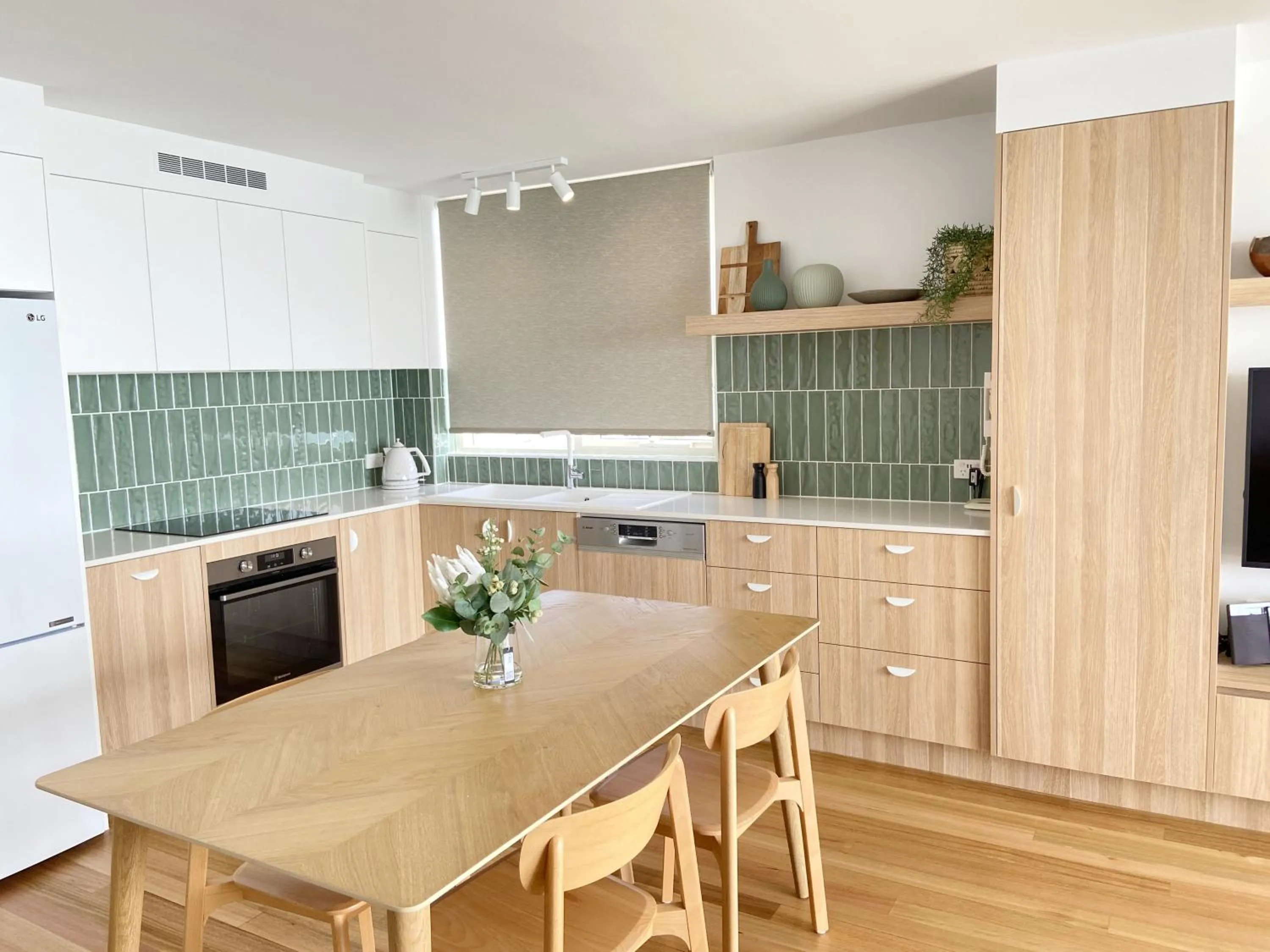 kitchen in 84 The Spit Holiday Apartments